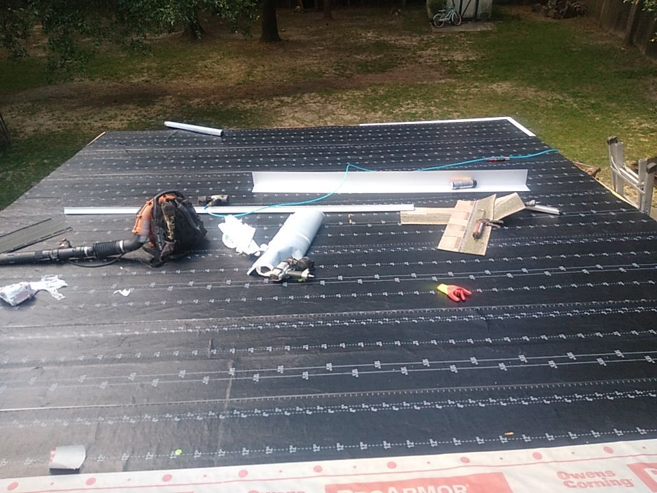 Residential Roofing Installation using Roof Replacement by American Roofing & Construction LLC