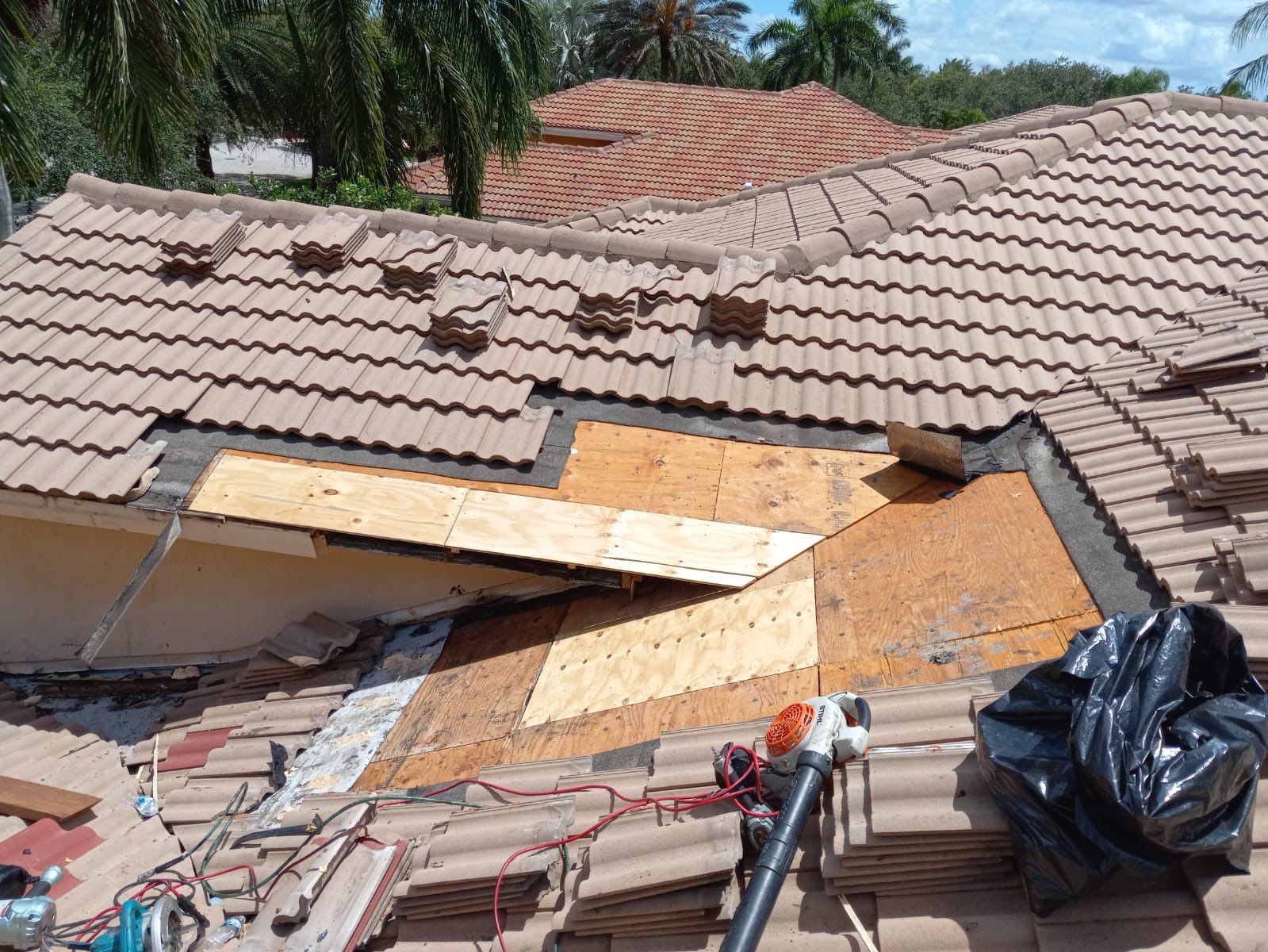 Concrete Tile Roof Leak Repair and Wood Decking Replacement in Parkland by Aastro Roofing