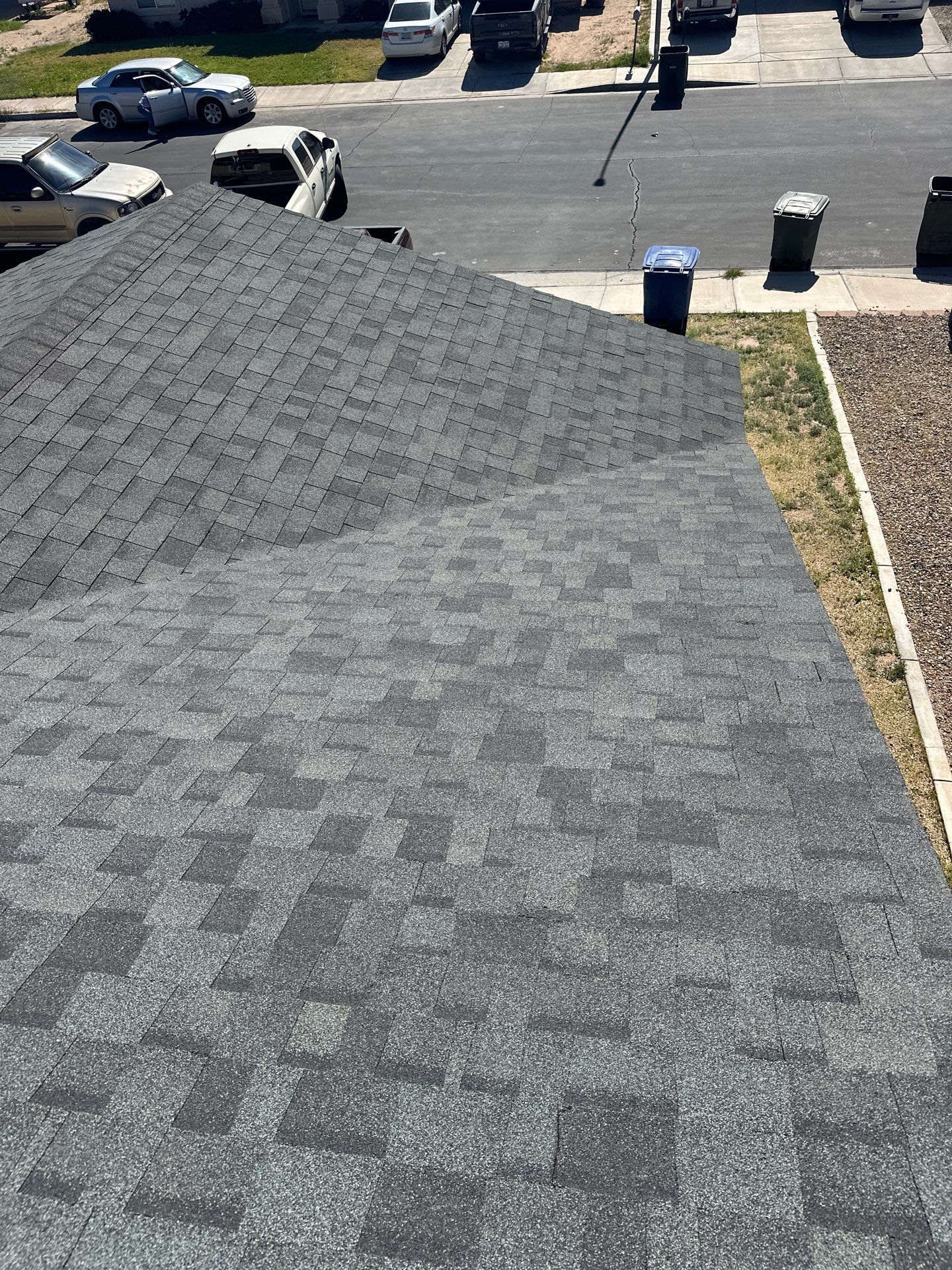 Estate Gray Shingles by Reimagine Roofing