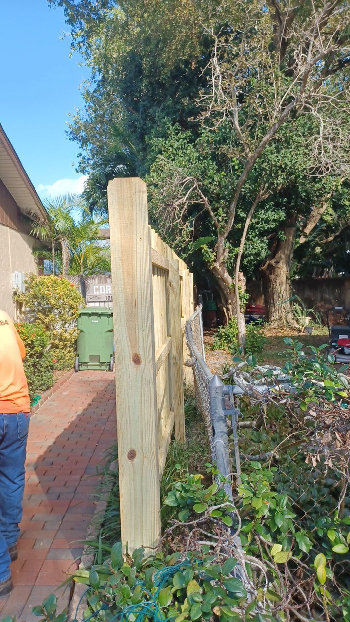 Bradenton, FL 6ft. Tall White Vinyl Privacy & Board on Board Wood Fence by Asap fence and gates, LLC