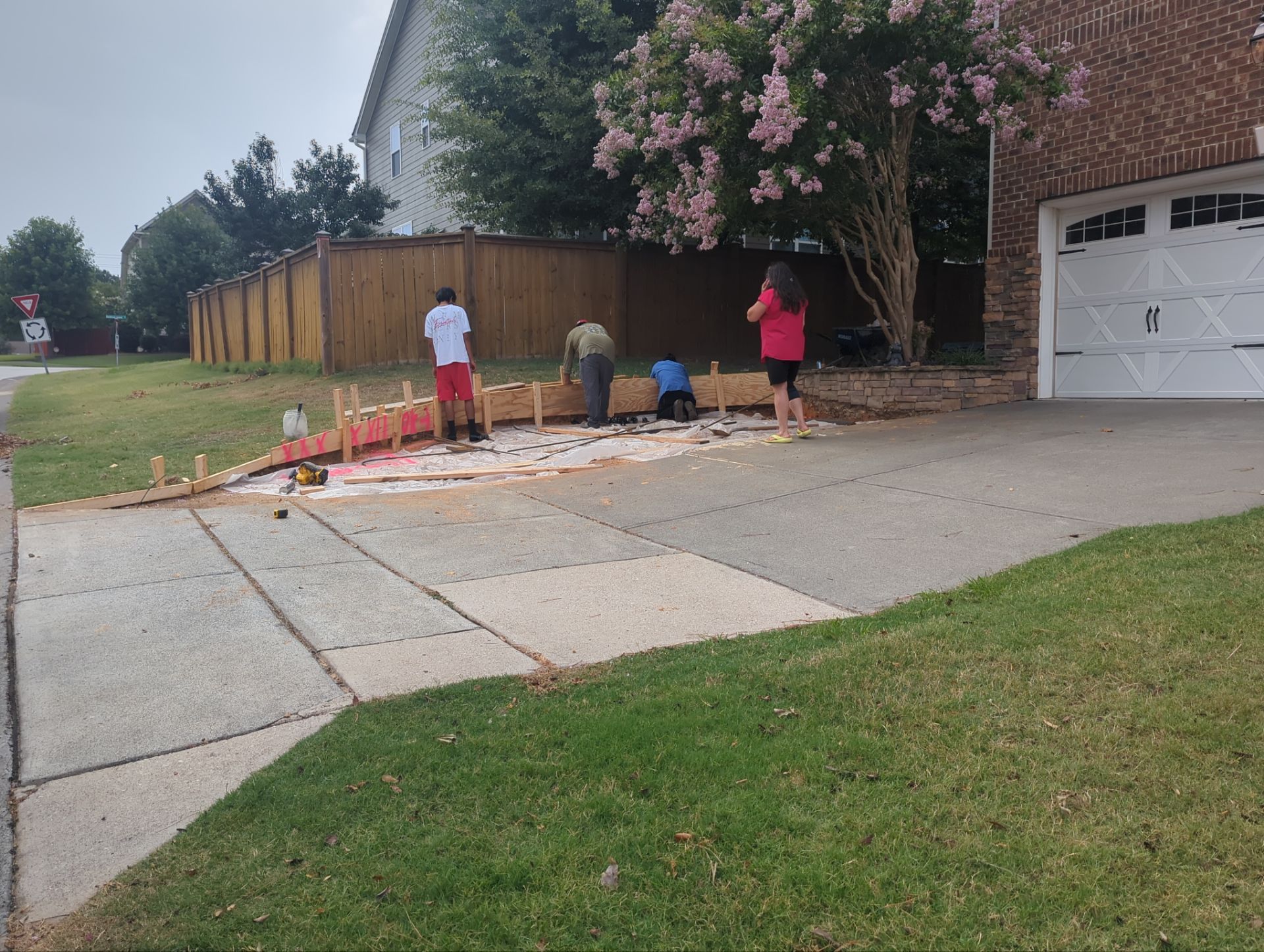 Concrete Driveway Expansion & Retaining Wall | Apex, NC by Elite Remodeling and Design LLC