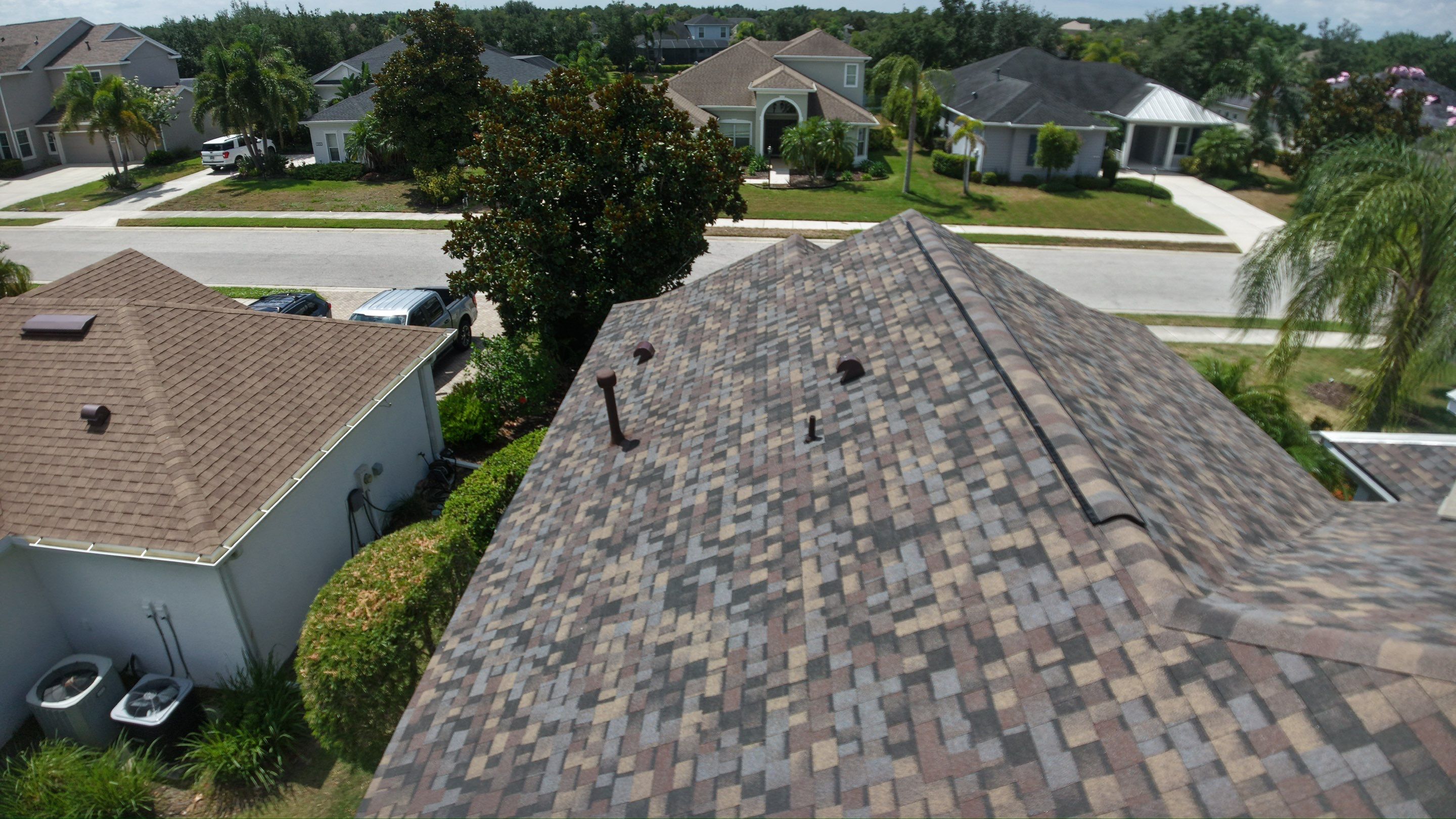 Architectural Summer Harvest Asphalt Shingle Roof Replacement in Bradenton, Florida by Trinity Restoration and Roofing LLC