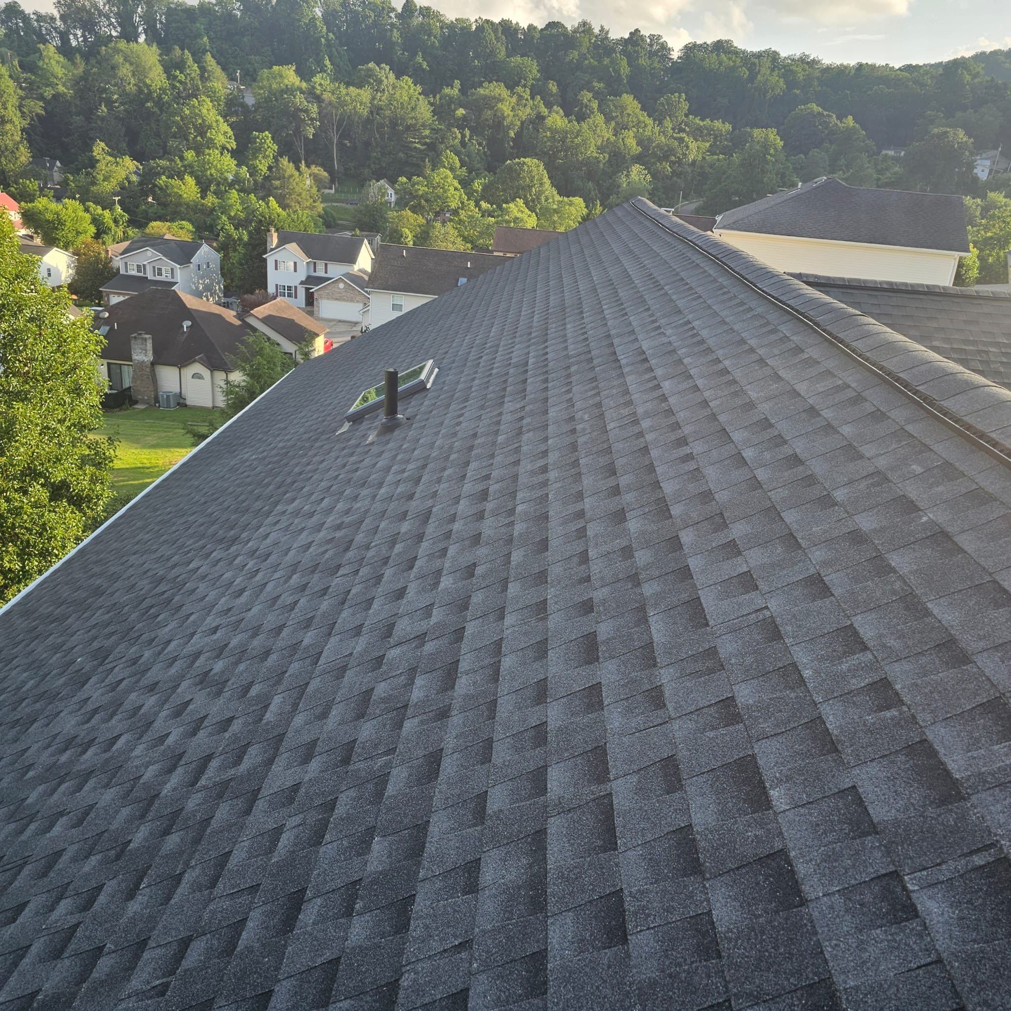 Residential Roofing Installation using GAF Timberline HDZ Charcoal by Rainstoppers Roofing