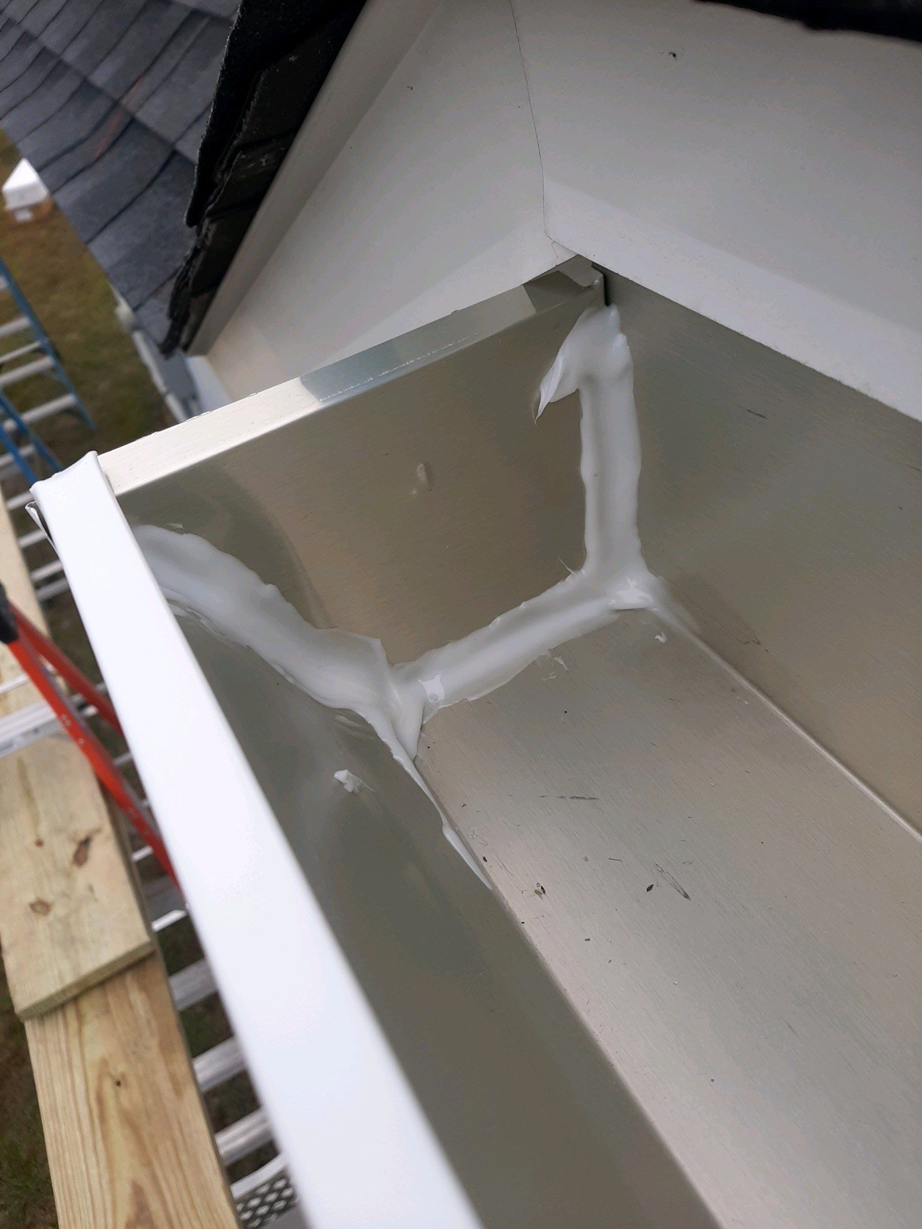 Gutter Installation using White K-Style Seamless Gutters by Gutter Professors