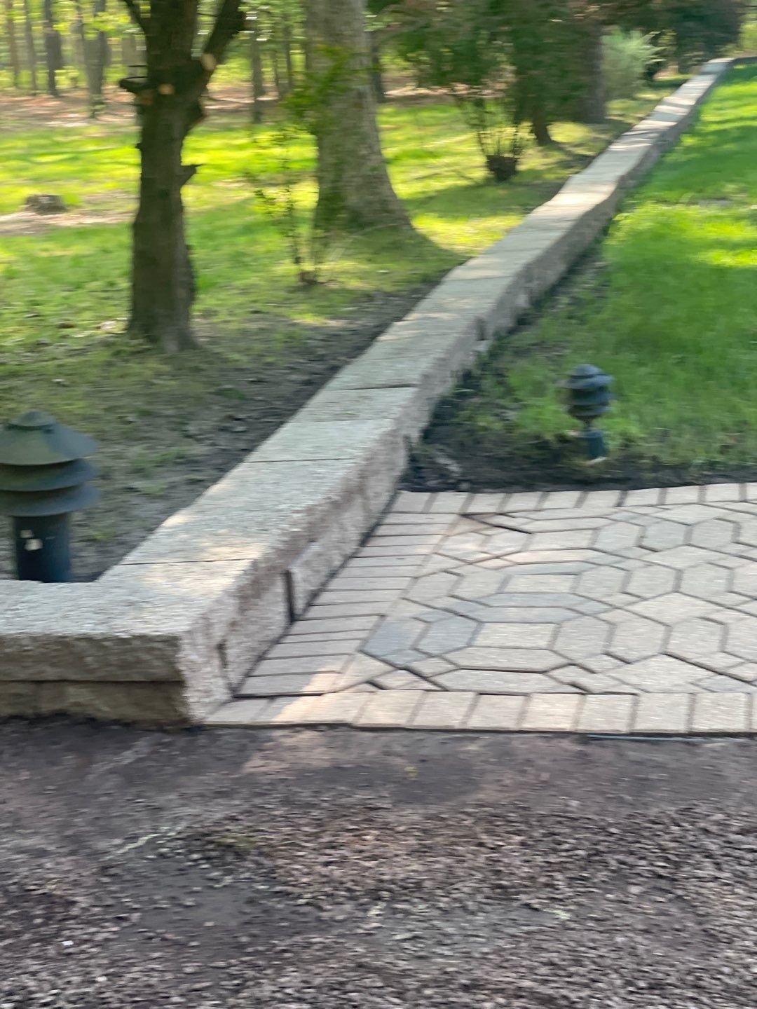 Pavers Cleaned, Garage and Concrete walls by SJ Exterior