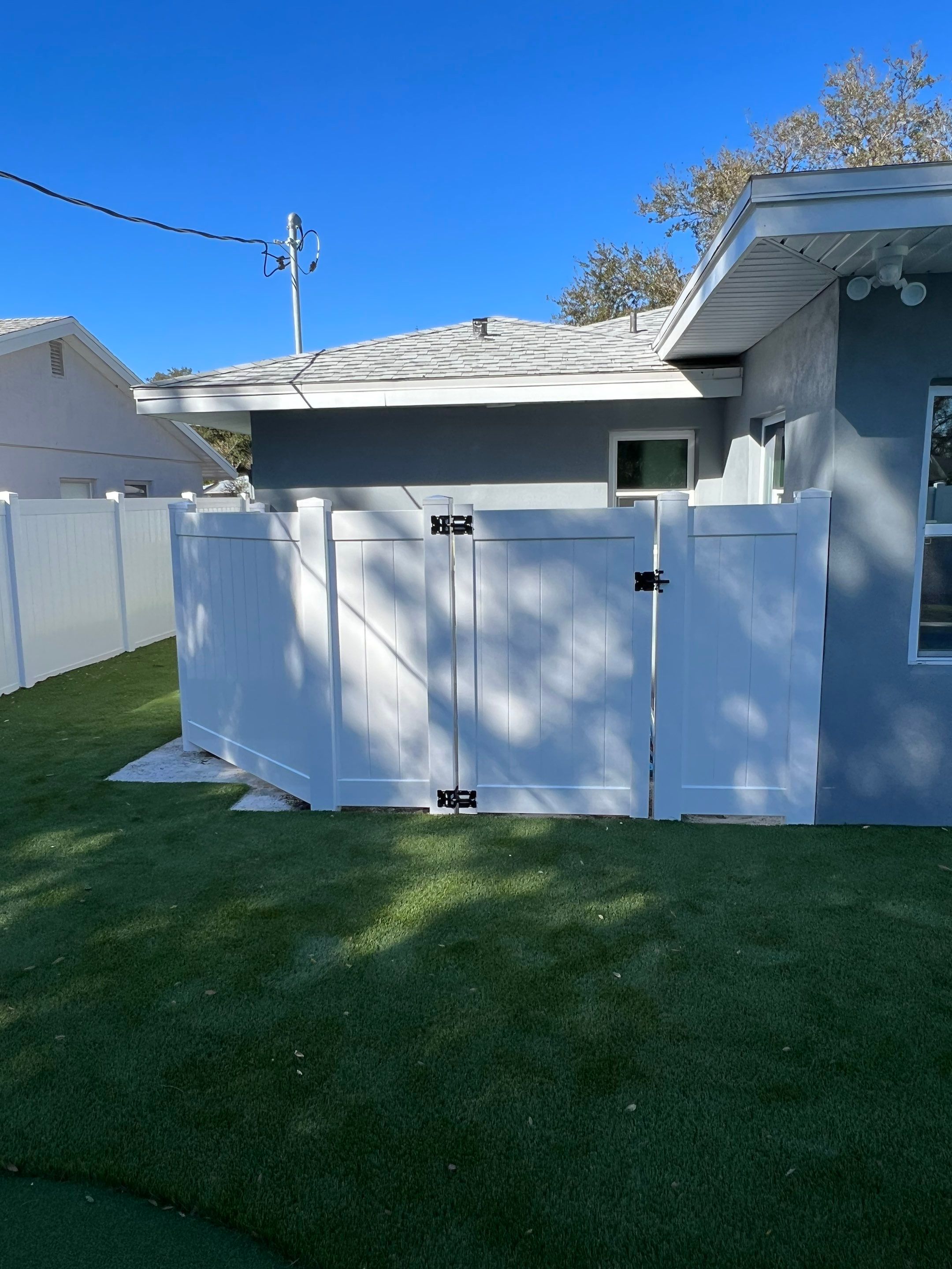 Vinyl Privacy Fence With AC Enclosure and Storage Corral by Asap fence and gates, LLC