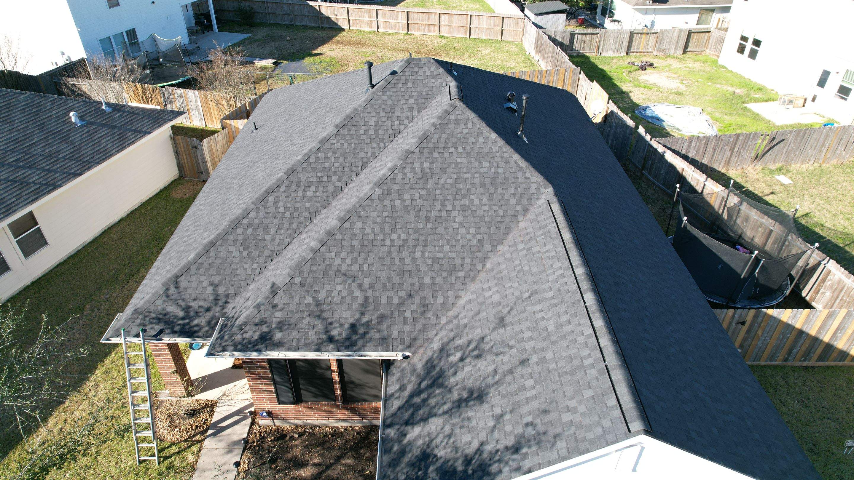 Charcoal Hip-Roof Replacement — Humble, TX by PL Roofing & SB Roofing, LLC.