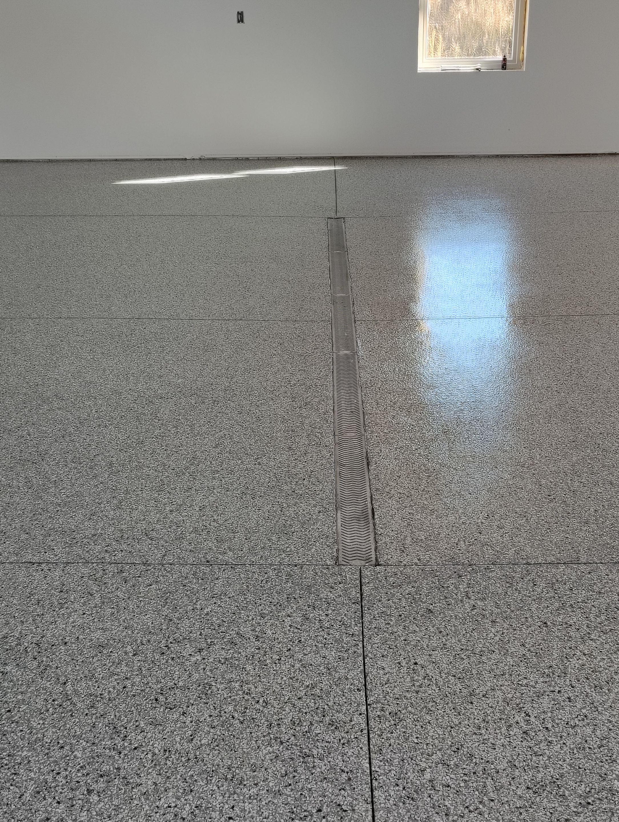 Custom Garage and Basement Epoxy Floor Coating in Menno by Select Painting, Coatings & Garage Cabinets