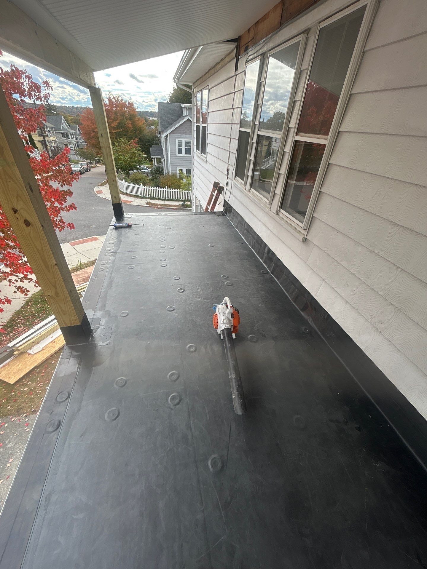 Watertown Porch EPDM Rubber Roof Installation by Mighty Dog Roofing of Greater Middlesex County