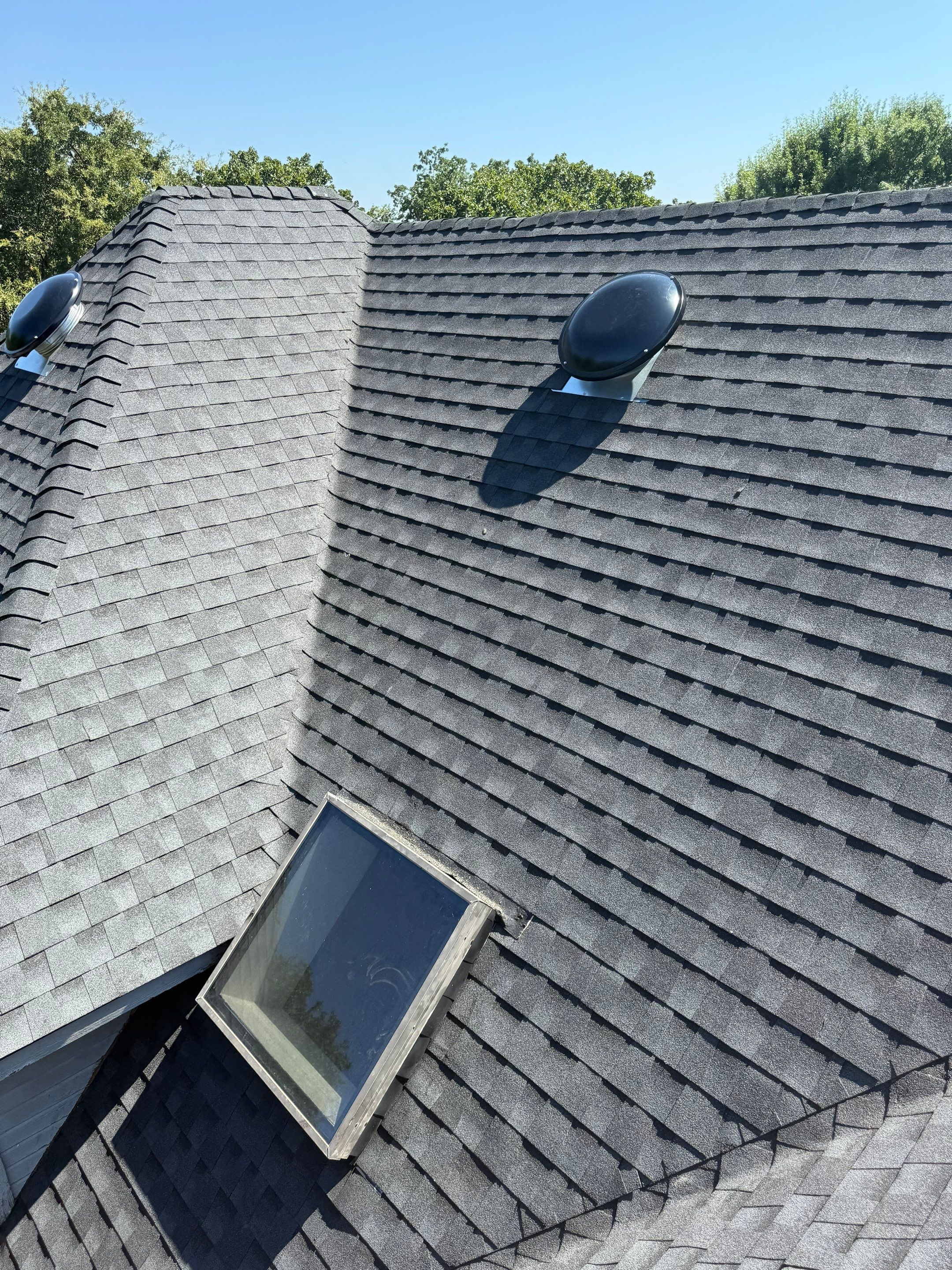 roof replacement & skylight repair in Edmond by McCann's Roofing and Construction