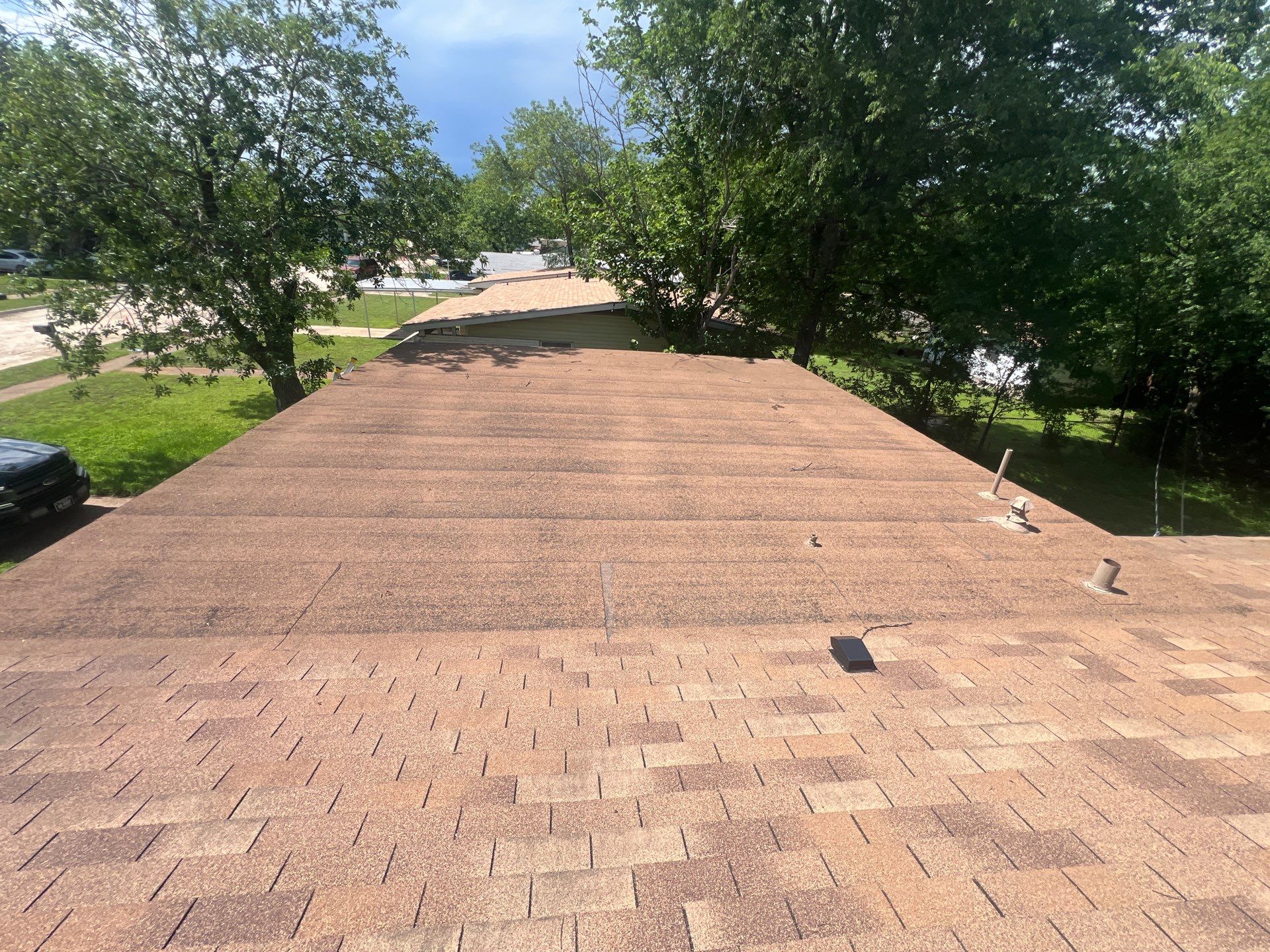 Residential Roofing Installation using IKO Cambridge Dual Black and Mule Hide Rolled Roofing Base and Cap Sheet by WR Roofing Solutions