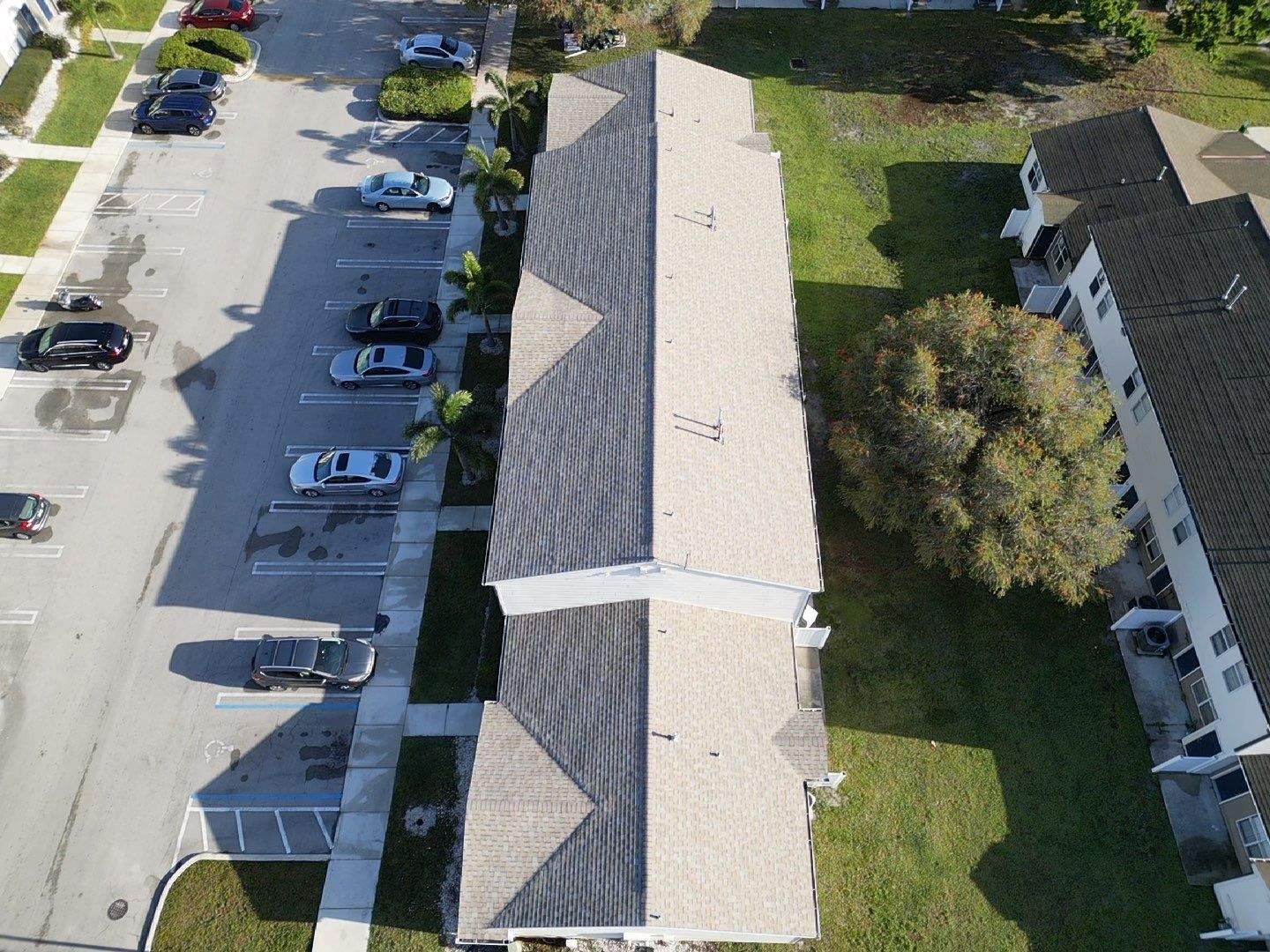 Apartment Complex Shingle Roof Replacement by Sailfish Roofing