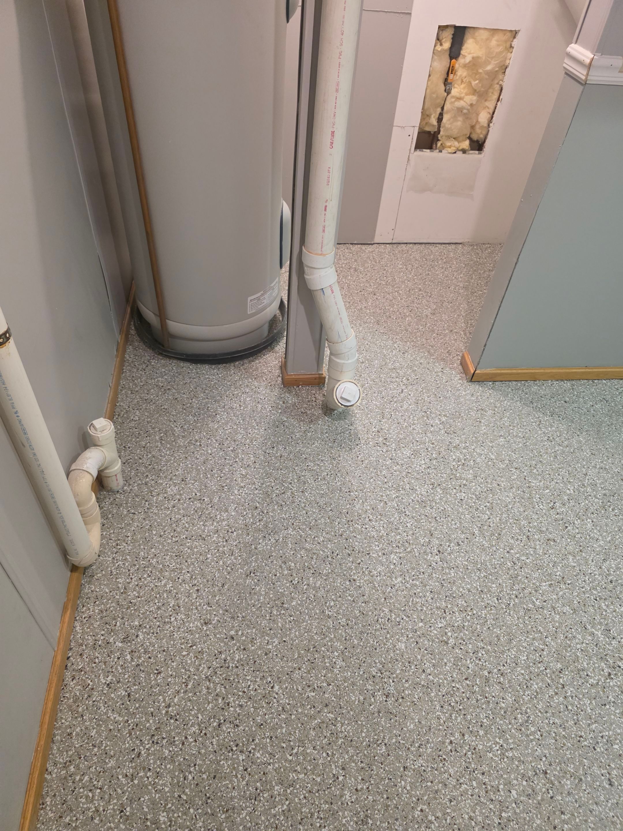 Full Garage and Basement Epoxy Floor Coating in Winner by Select Painting, Coatings & Garage Cabinets