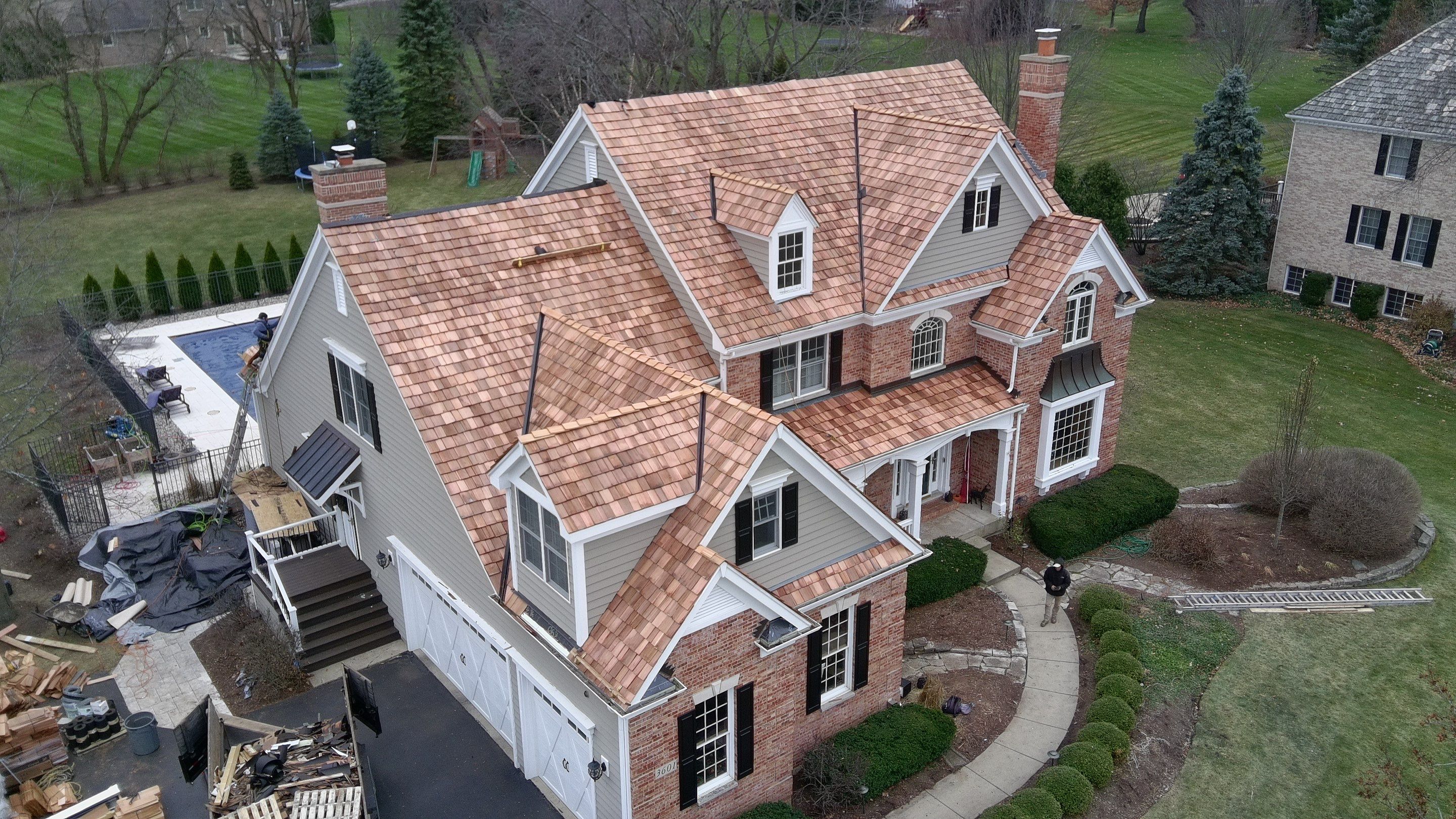 Re-roof: Cedar Shake & Custom Copper by Midwest Building Solutions