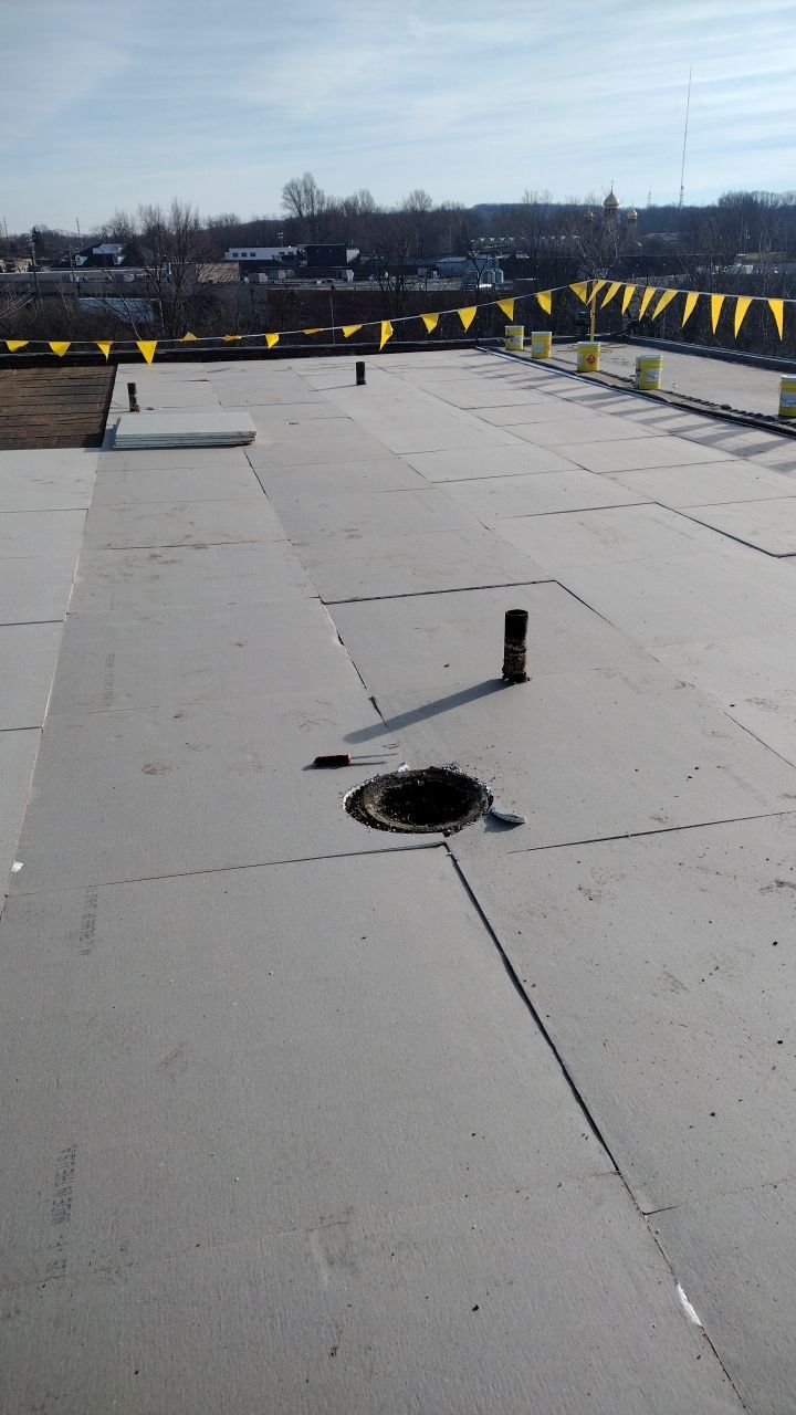 Commercial flat roof parma by Absolute Roofing and Construction