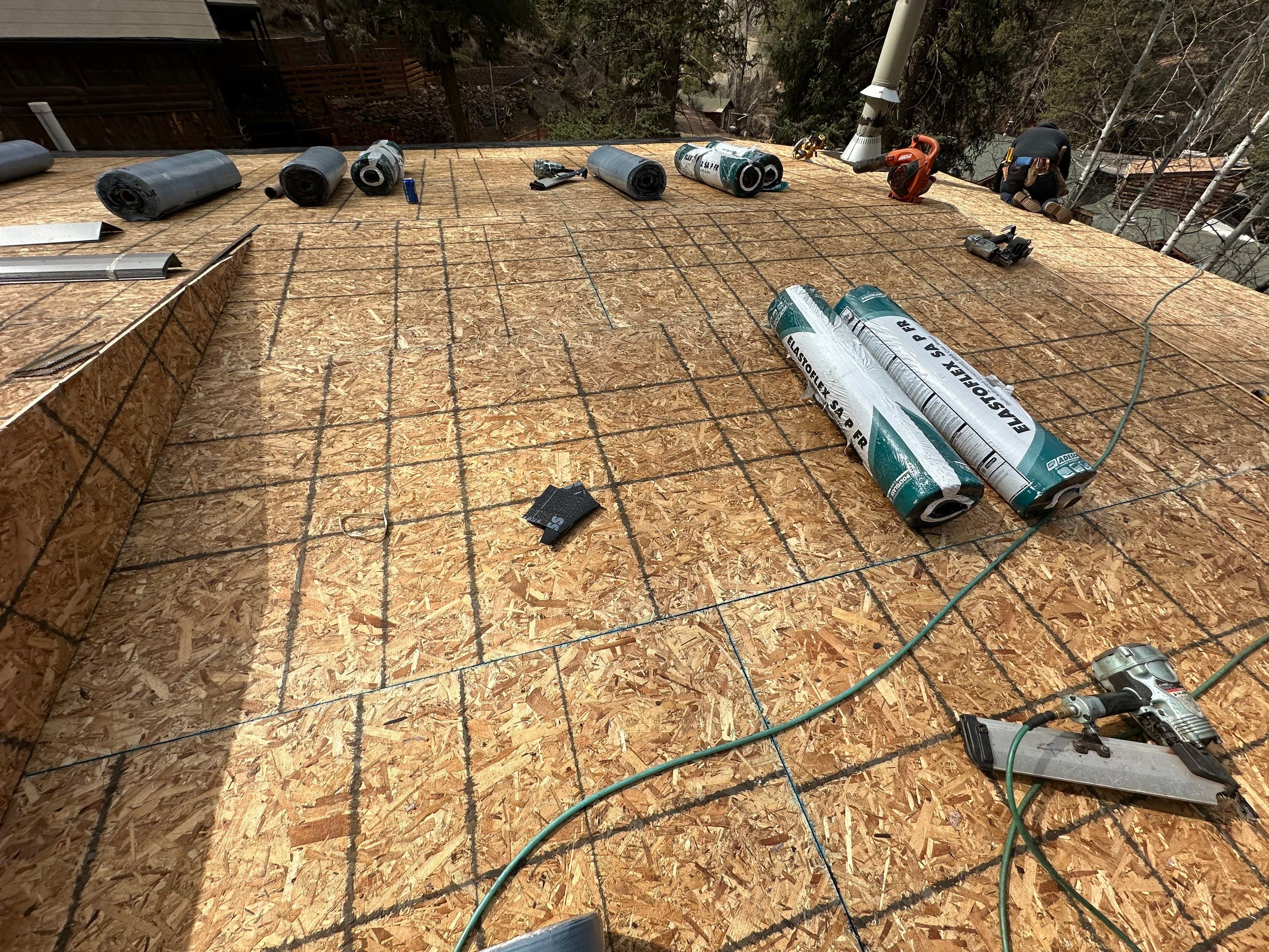 Residential Roofing Installation using Modified Bitumen Roofing by Blue Peaks Roofing LLC 
