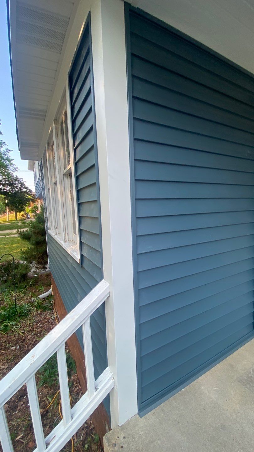 Asphalt Roof, Vinyl Siding, and Aluminum Gutter Replacement by Custom Installations