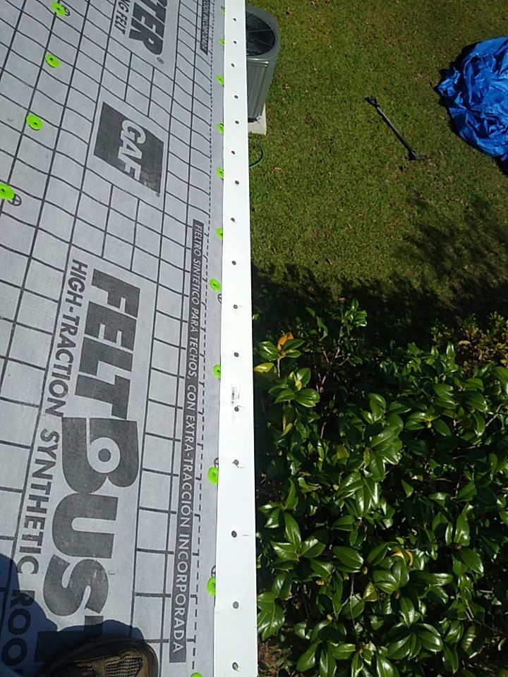 Residential Roofing Installation using Roof Replacement by American Roofing & Construction LLC