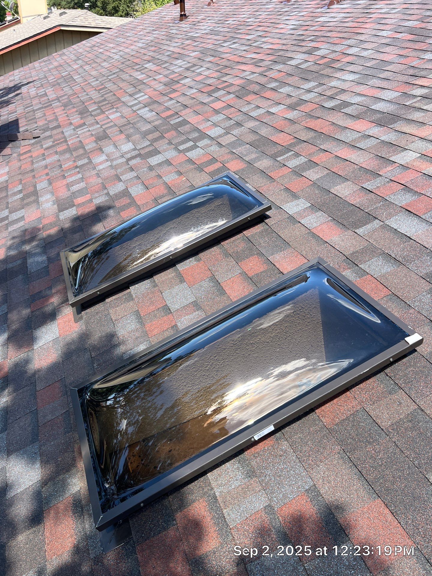 Merlot Roof Replacement & Tinted Skylight Installation | San Antonio, TX by Ayan Roofing