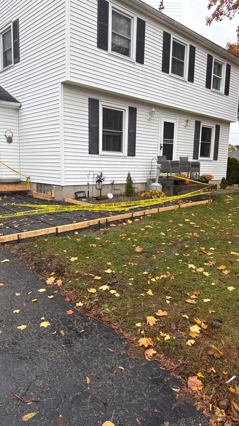 Broom finished concrete patio  by NG Masonry & Construction LLC