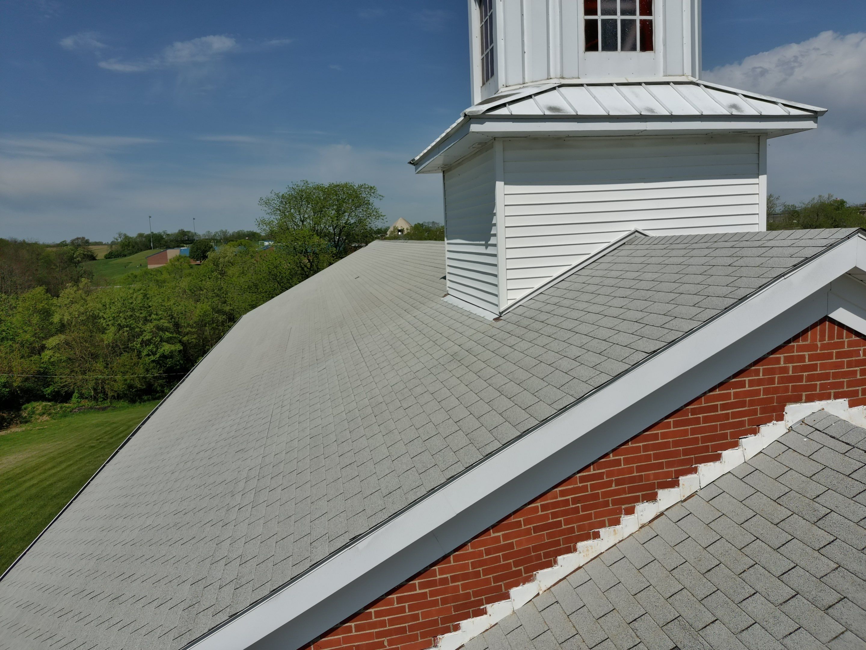 Commercial Roofing Installation using Performance Shingles by Mr. Roofer