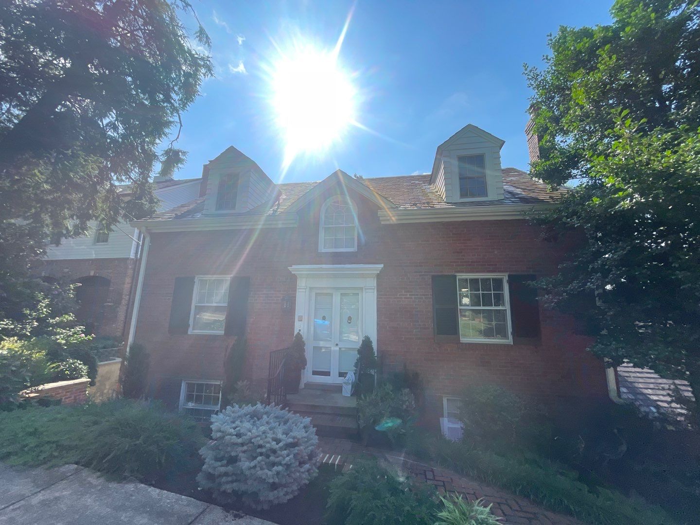 Sleek Tesla Solar Roof + Powerwall Installation | Alexandria, VA by American Home Contractors