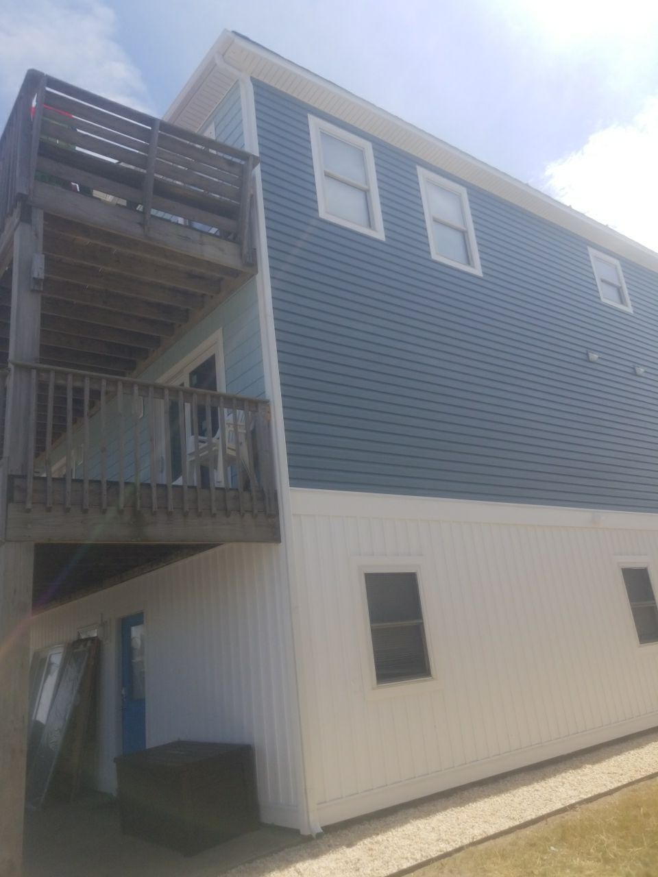 From Bland to Blue by Gallop Roofing & Remodeling, Inc.