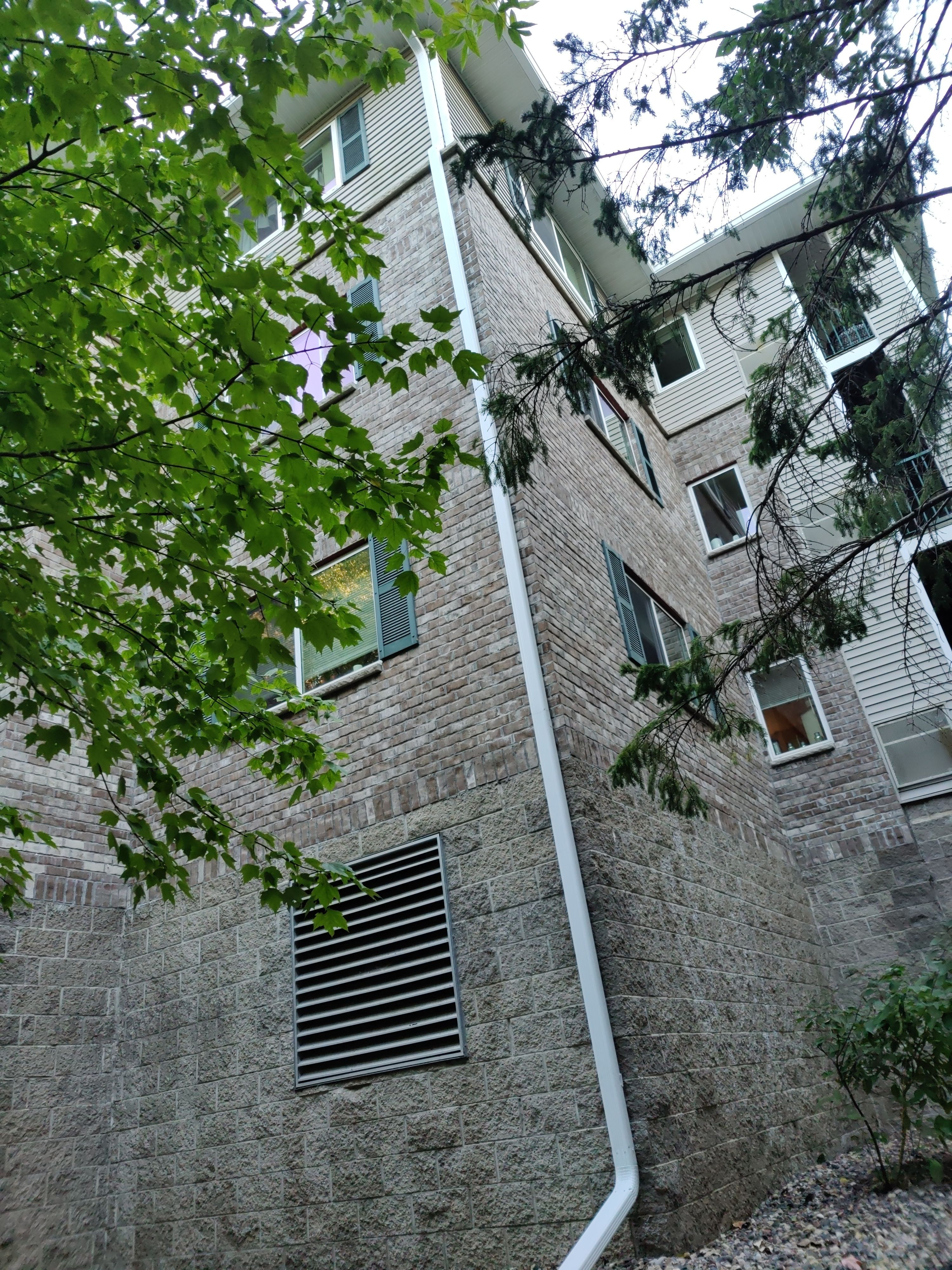6" White Seamless gutters on Apartment Building- Prior Lake, MN by Next Level Seamless Gutters / Exteriors Inc.