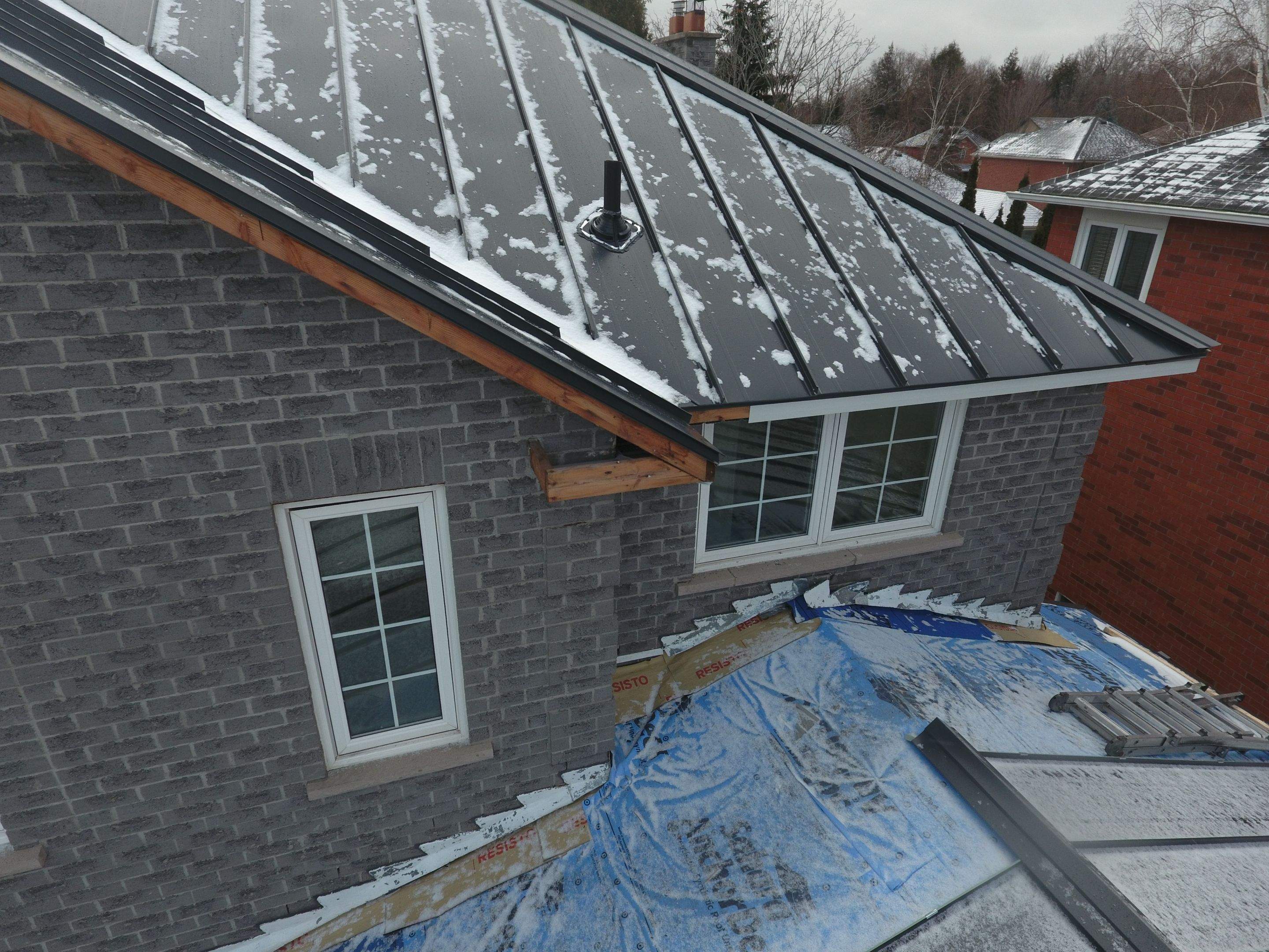 Roof Replacement using 16" Standing Seam Panels by Jay Carter Roofing & Sheet Metal