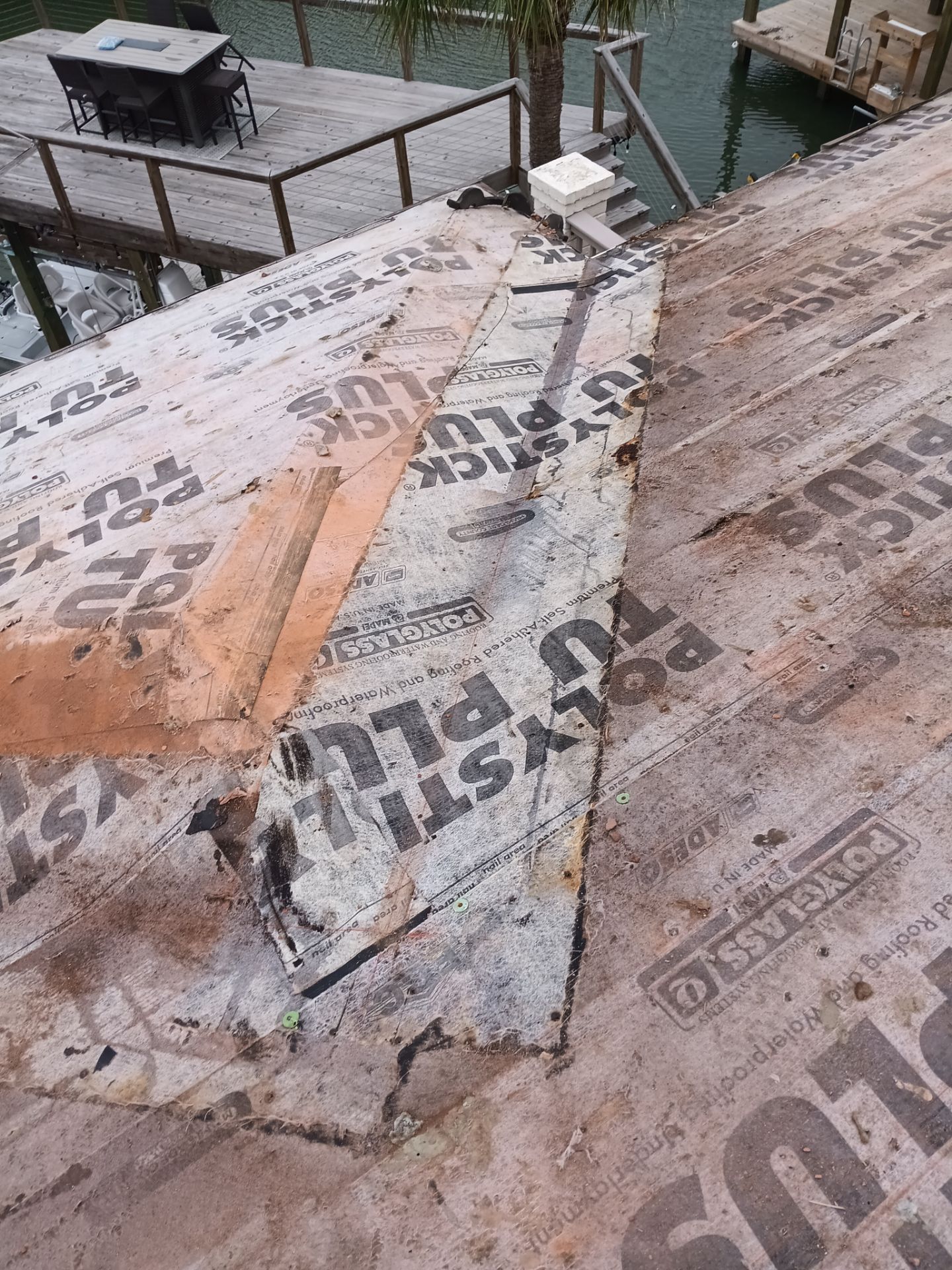 Off with the Tile and on with the TILCOR stone coated metal.  by Bayfront Roofing and Construction