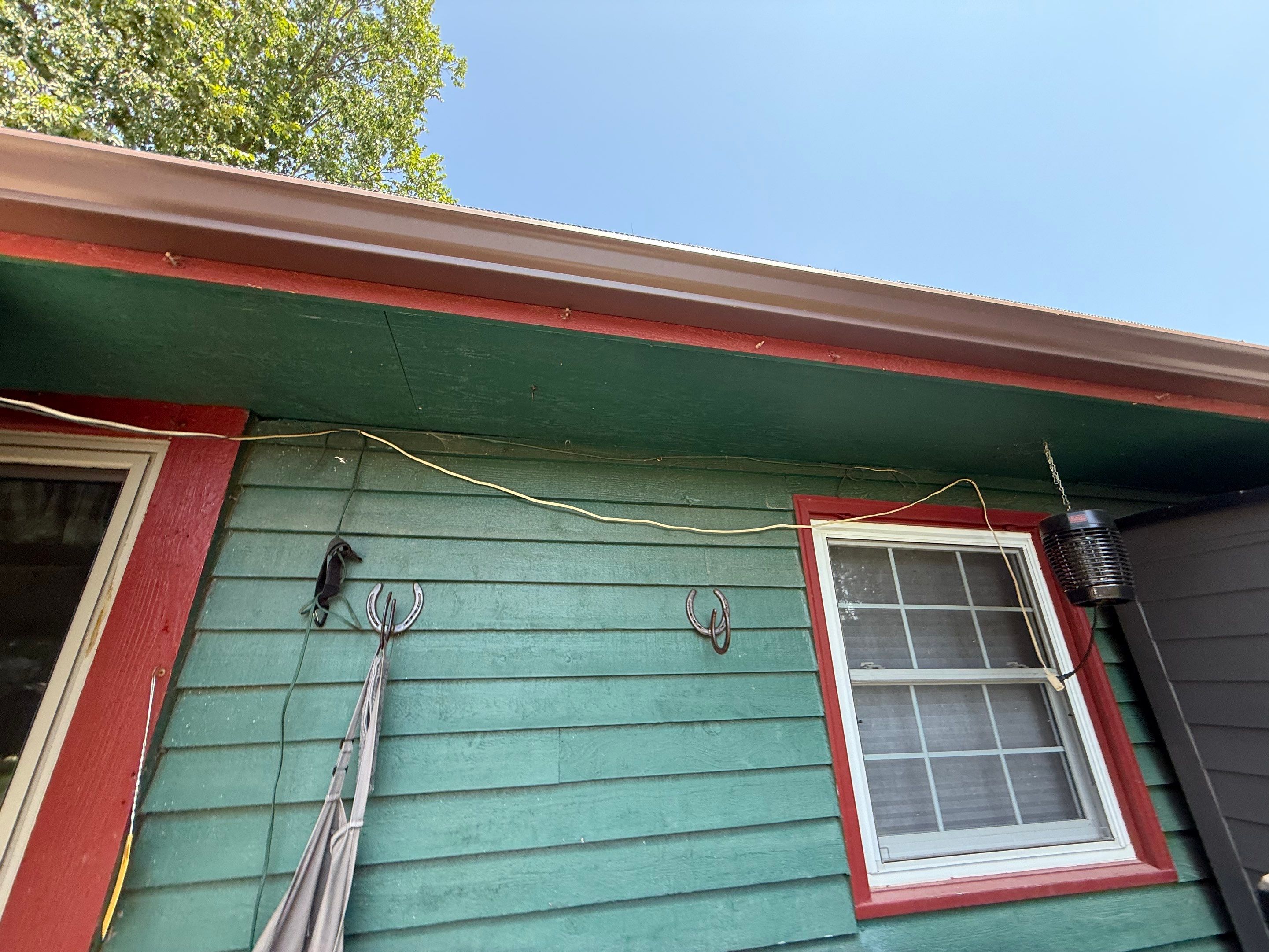 Wood siding refresh by Pezley Painting