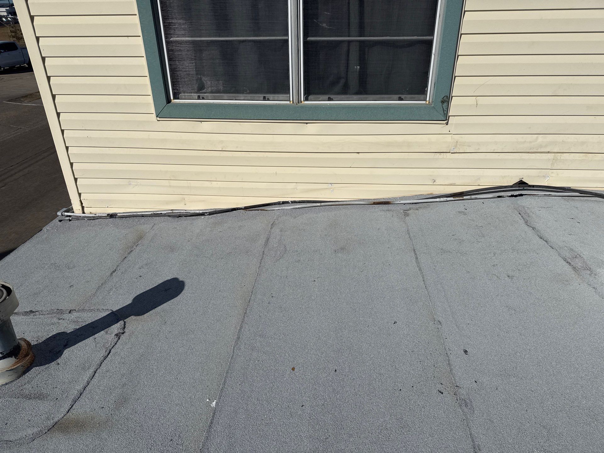 Mustang Island Flat Top by Bayfront Roofing and Construction