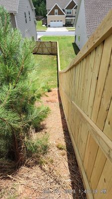 Fence Installation of Capped Wood Privacy