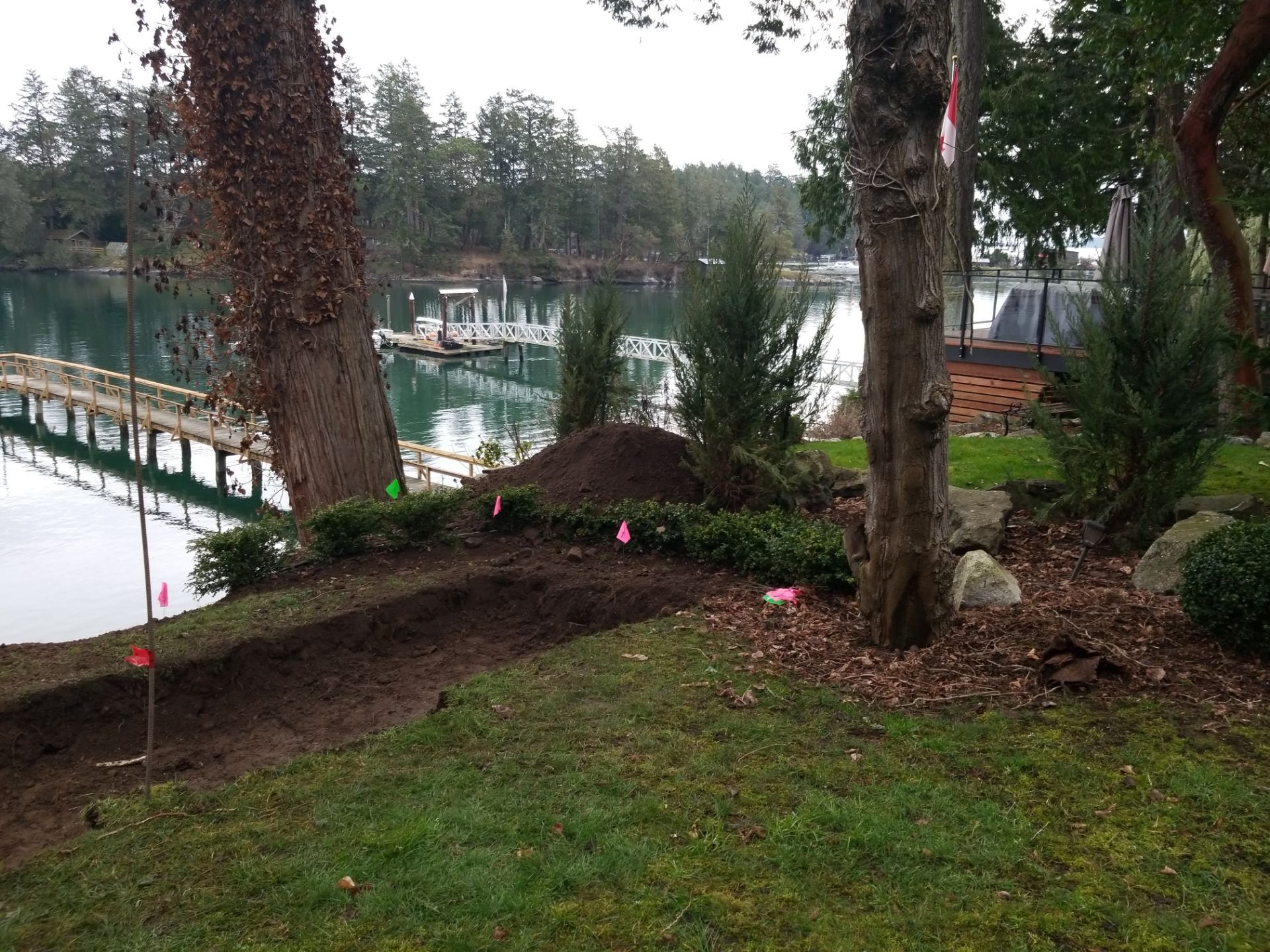 Coastal Landscape Restoration & Retaining Structure - In progress by Habanero Garden and Exterior Care