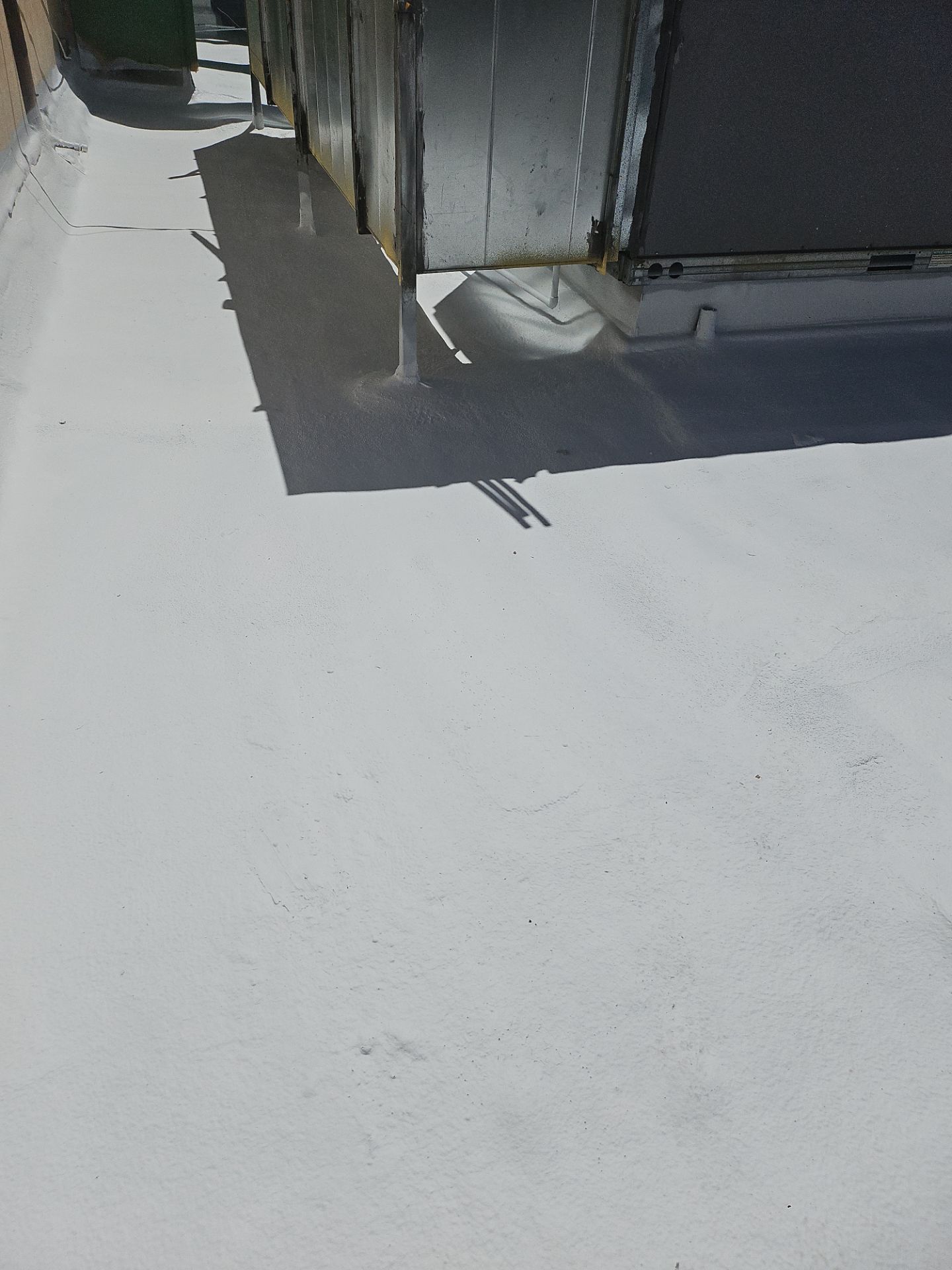 Spray foam and coatings using General Coatings acrylic coatings and spray foam by Straight Edge Roofing Inc