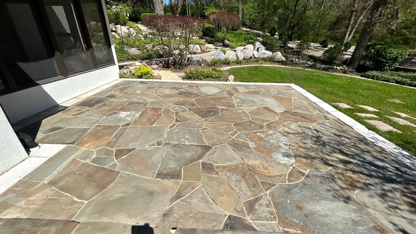 natural stone using Algaecide, soft wash soap by Northern Power Washing LLC.