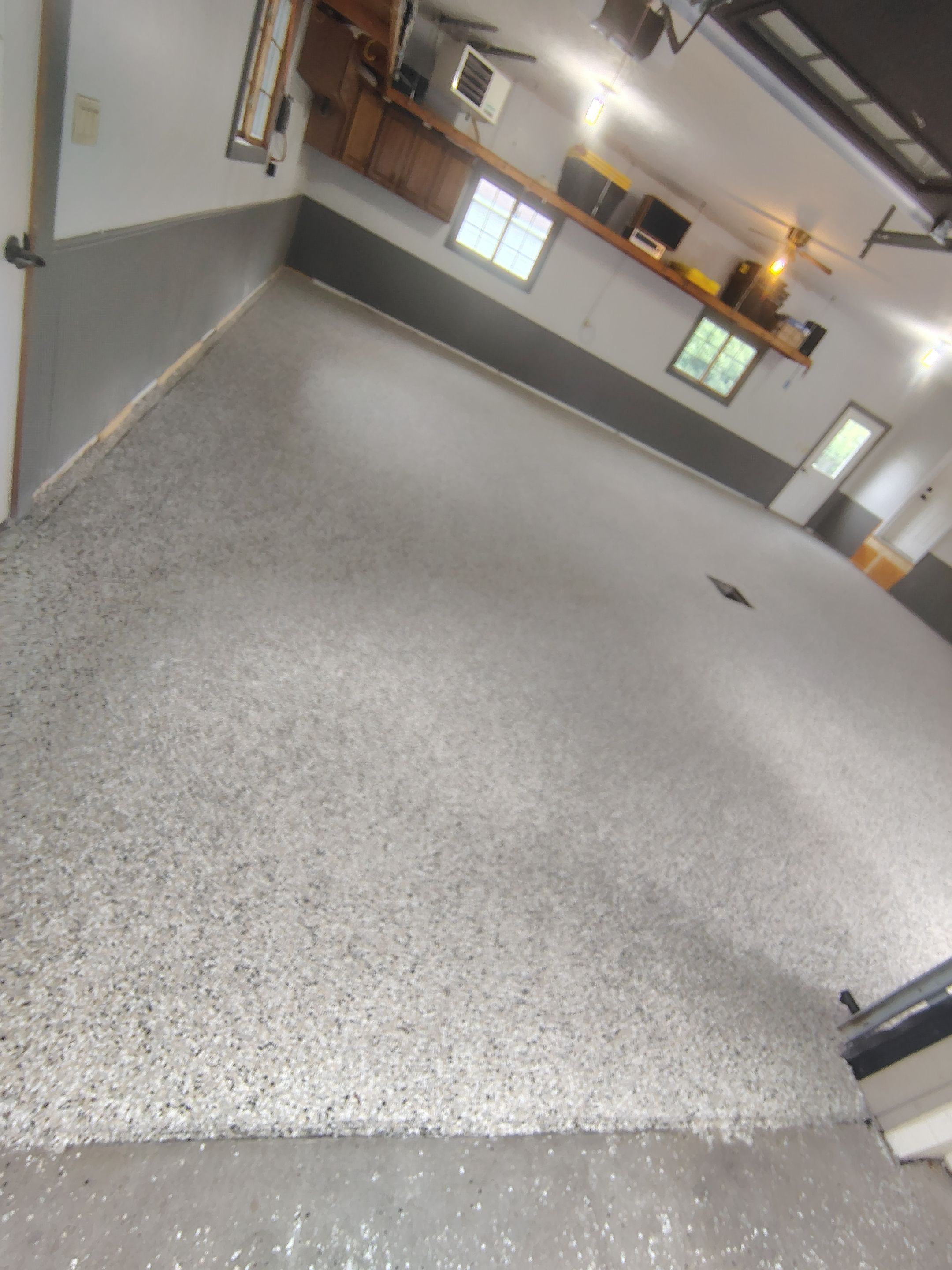 Multi-Fleck Epoxy Garage Floor Coating in Dell Rapids by Select Painting, Coatings & Garage Cabinets