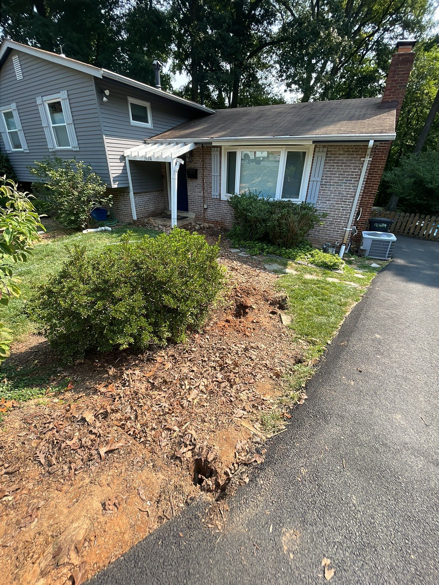 New walkway with stairs and a new front porch by Fairfax Contractors, LLC