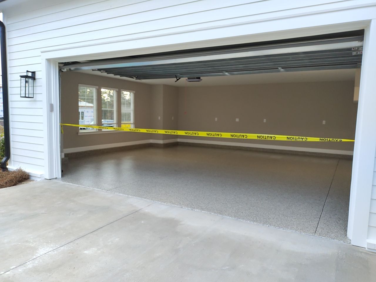 Mediterranean Car Garage! by Deese Elite Concrete Coatings