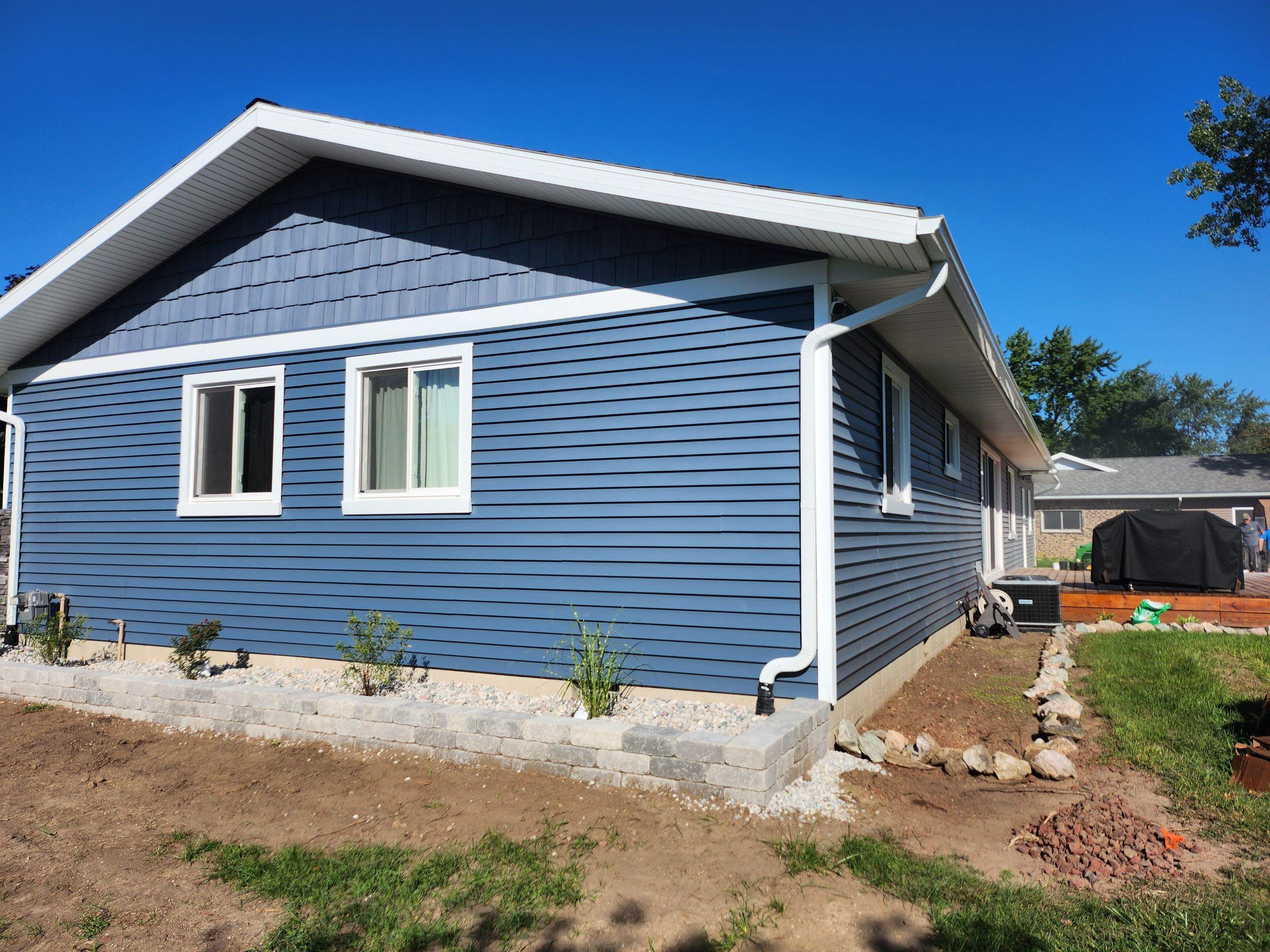 We gave this house a huge make over! by Energy Plus Home Improvements
