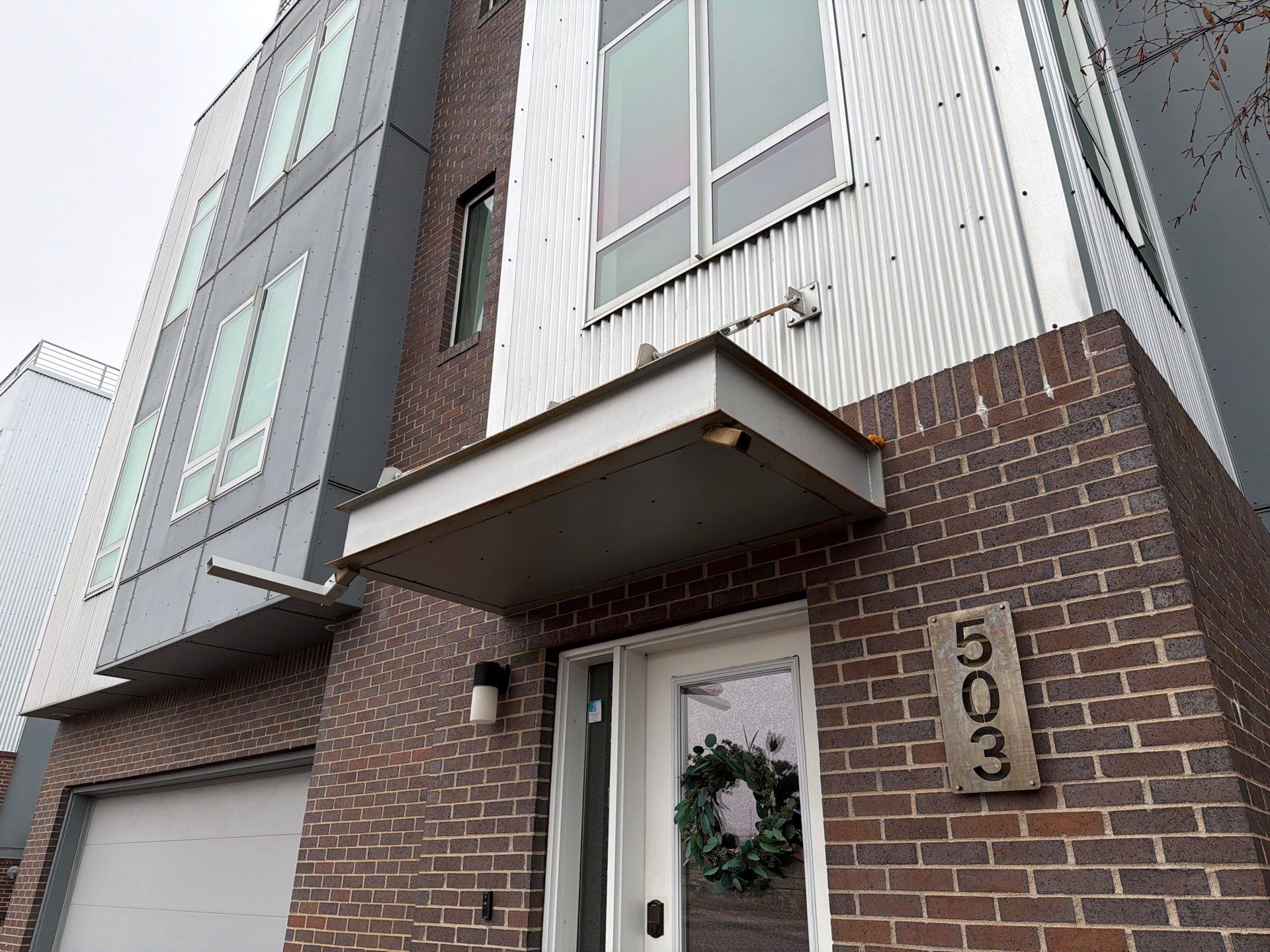 Modern Multi-Unit Exterior Painting and Siding Refresh in Sioux Falls by Select Painting, Coatings & Garage Cabinets