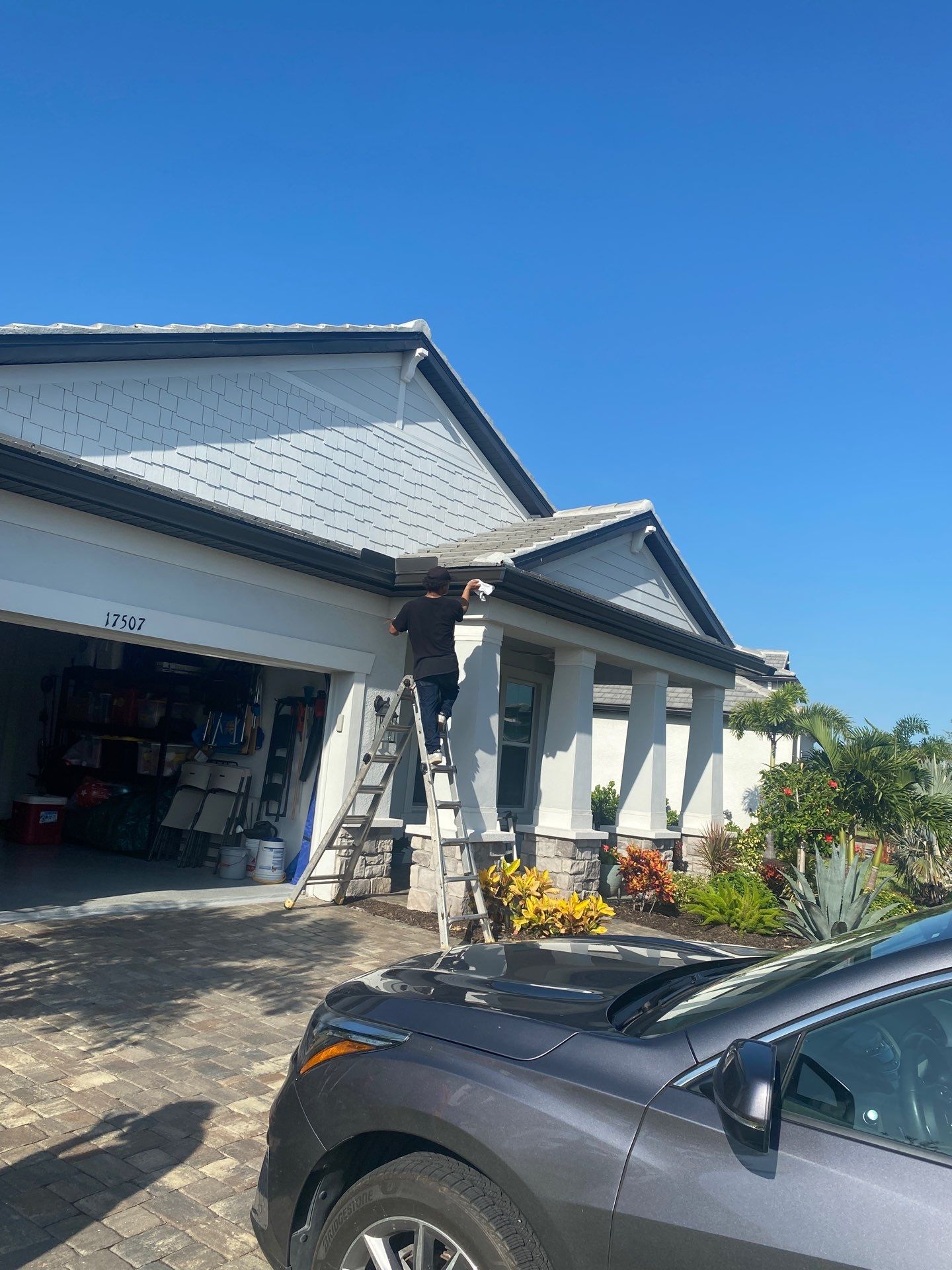 Black 7-Inch Gutters with Matching Downspouts in Lakewood Ranch FL by Gutter Professor by Gutter Professors