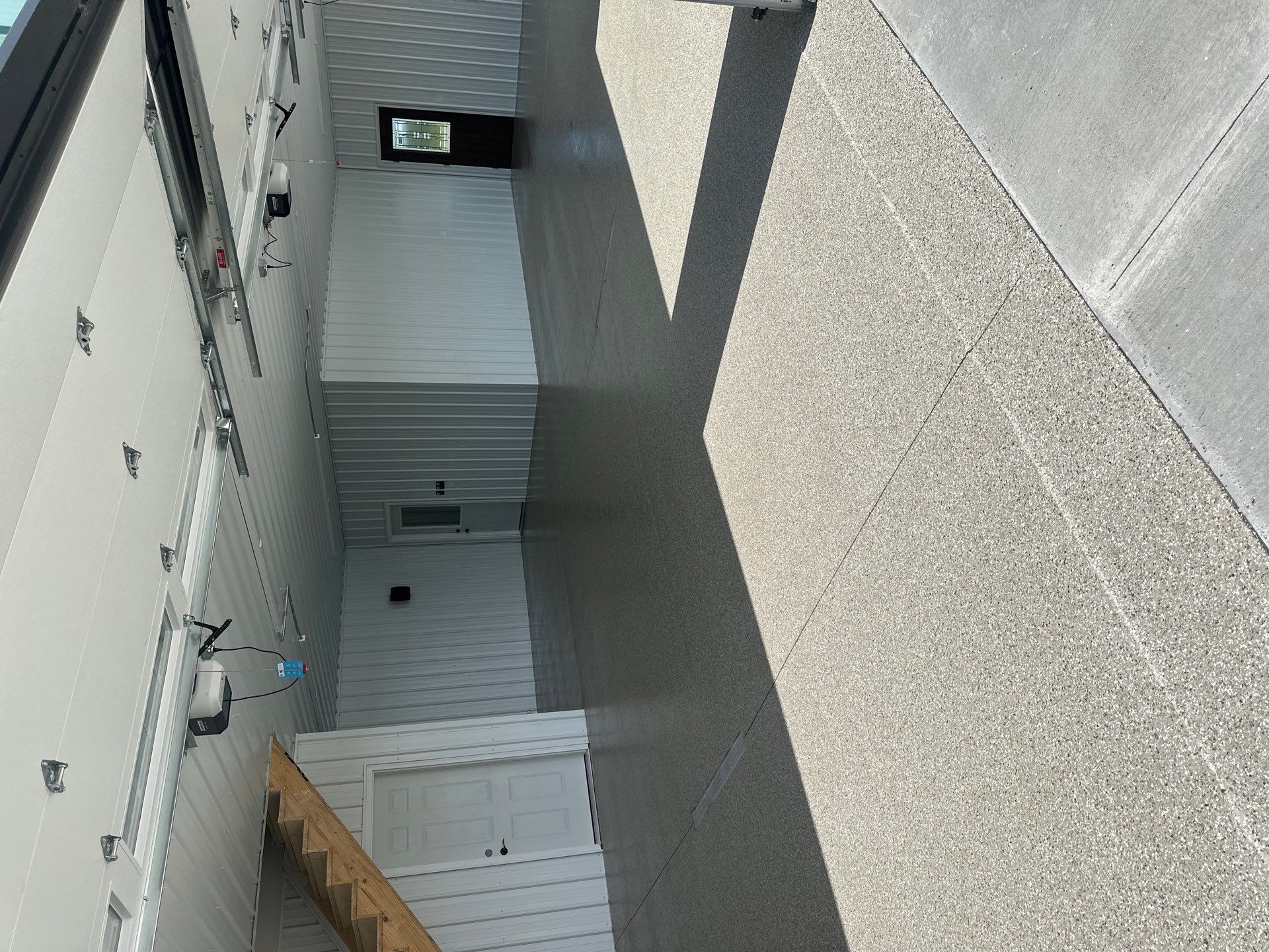 Another Long-Lasting Floor Delivered by Revival for this Shouse by Revival Concrete Coatings