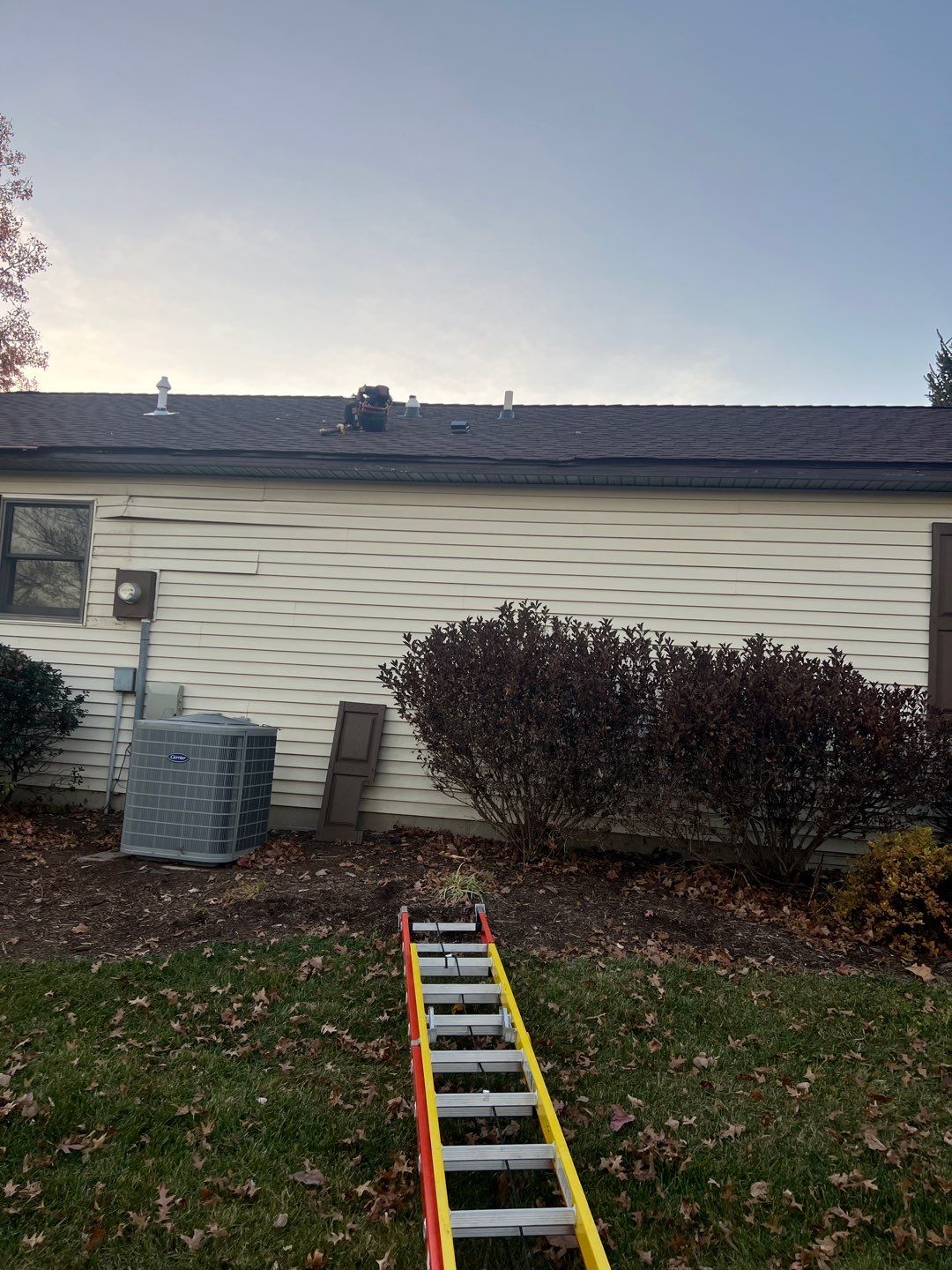 New Black Gutters, Post Wrap, and Garage Wrap by Storm Contracting 