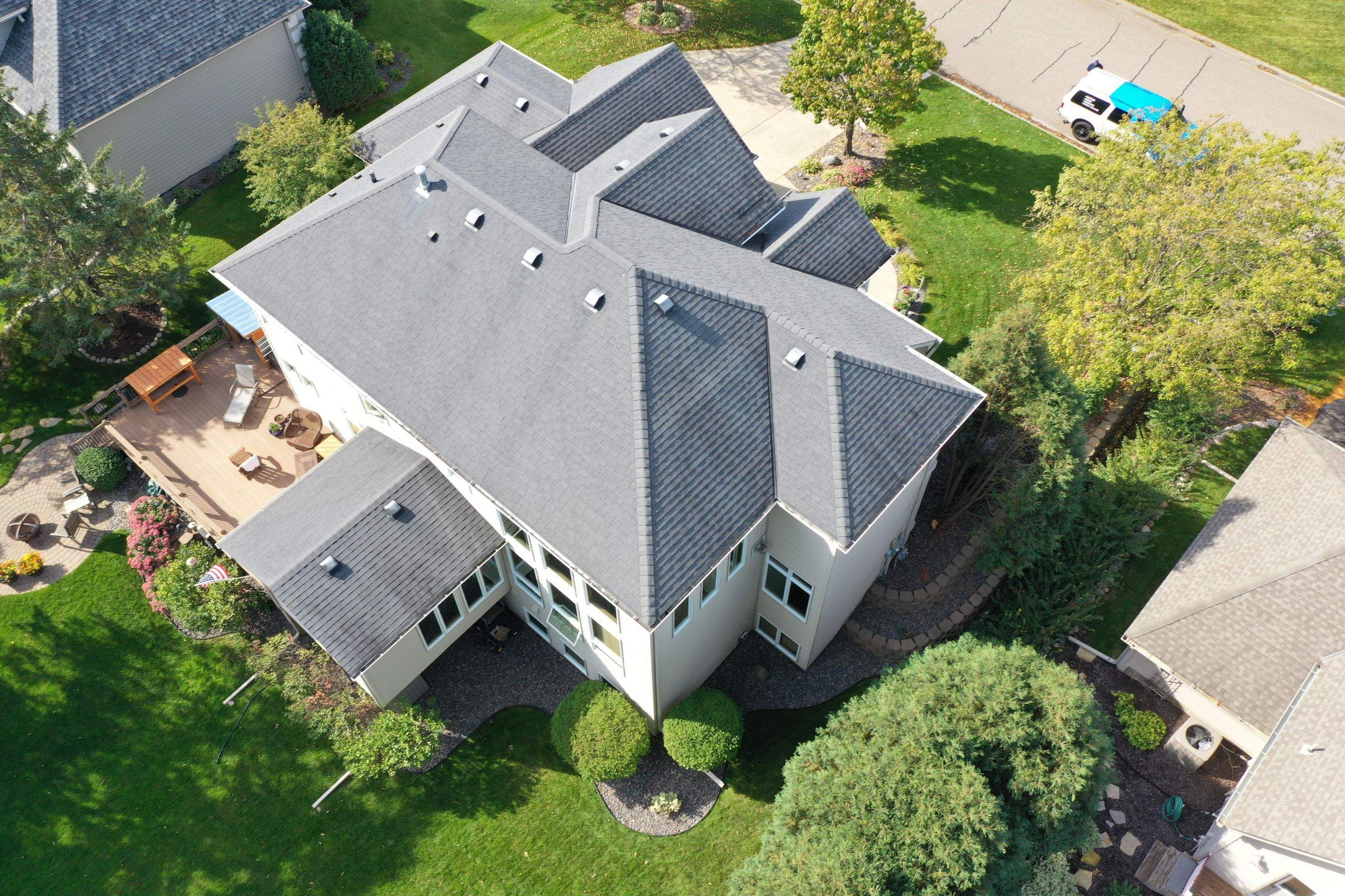 Residential Roofing Installation using Certainteed Landmark Moire Black by MODERN EXTERIOR SYSTEMS