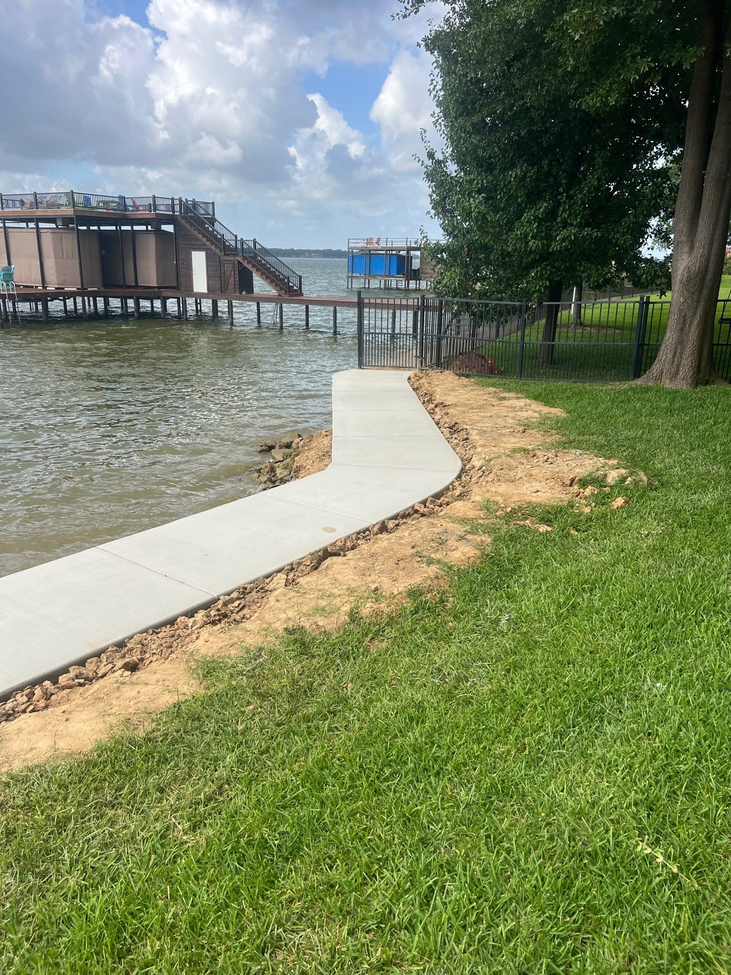 Retaining Cap Sidewalk at Cedar Creek Lake in Gun Barrel City by Rodriguez Concrete Construction