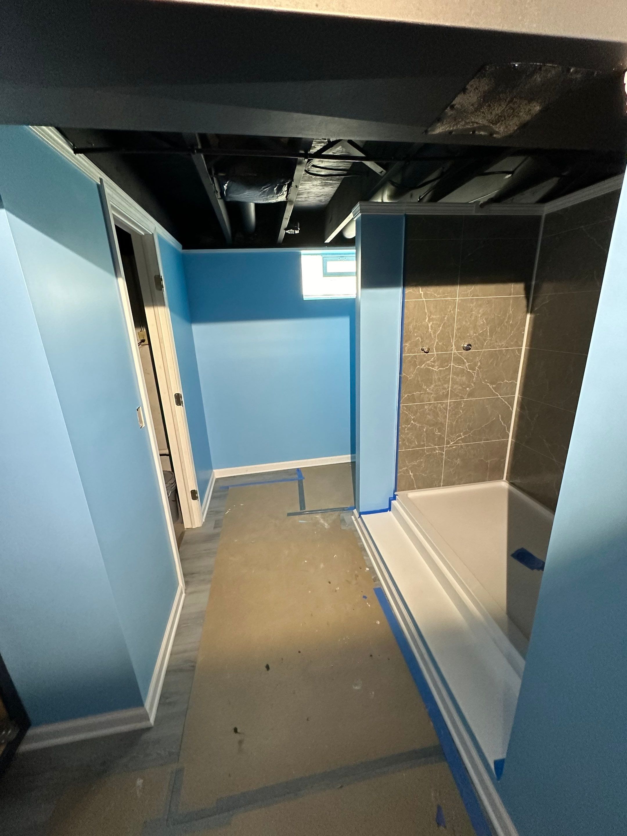 Basement Bathroom Remodel by Ivy Lea Construction