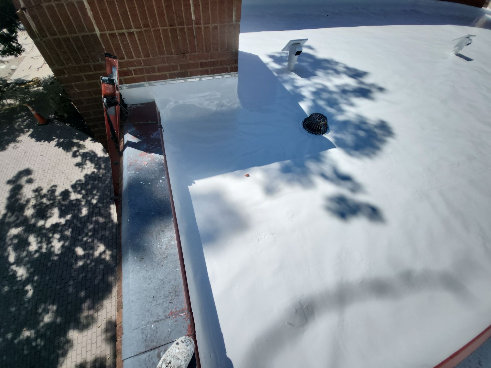 Roof Installation using Silicone TPO by ExteriorPros