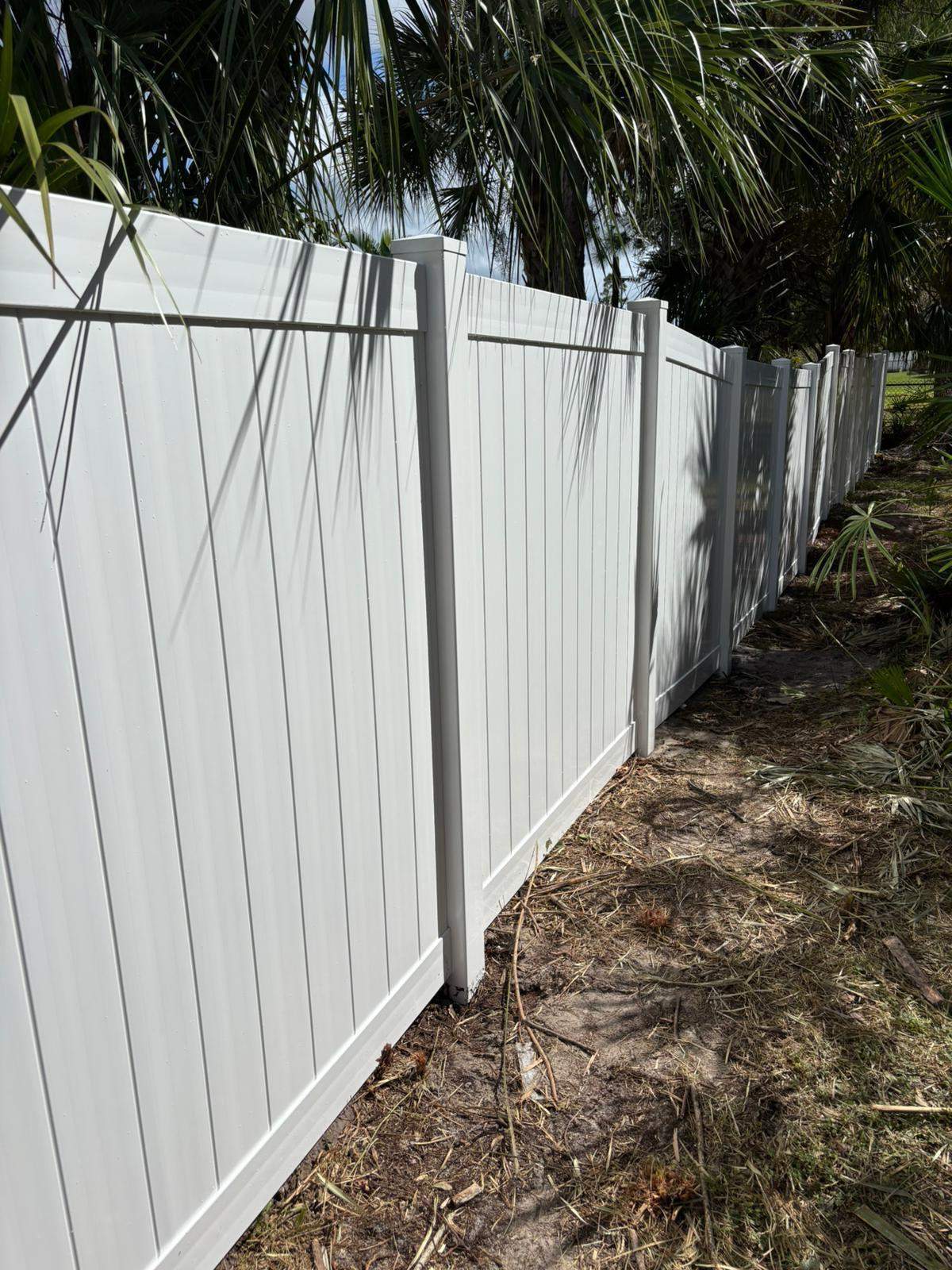 White Vinyl Privacy Fence and Gate Installation in North Port by True Fence LLC