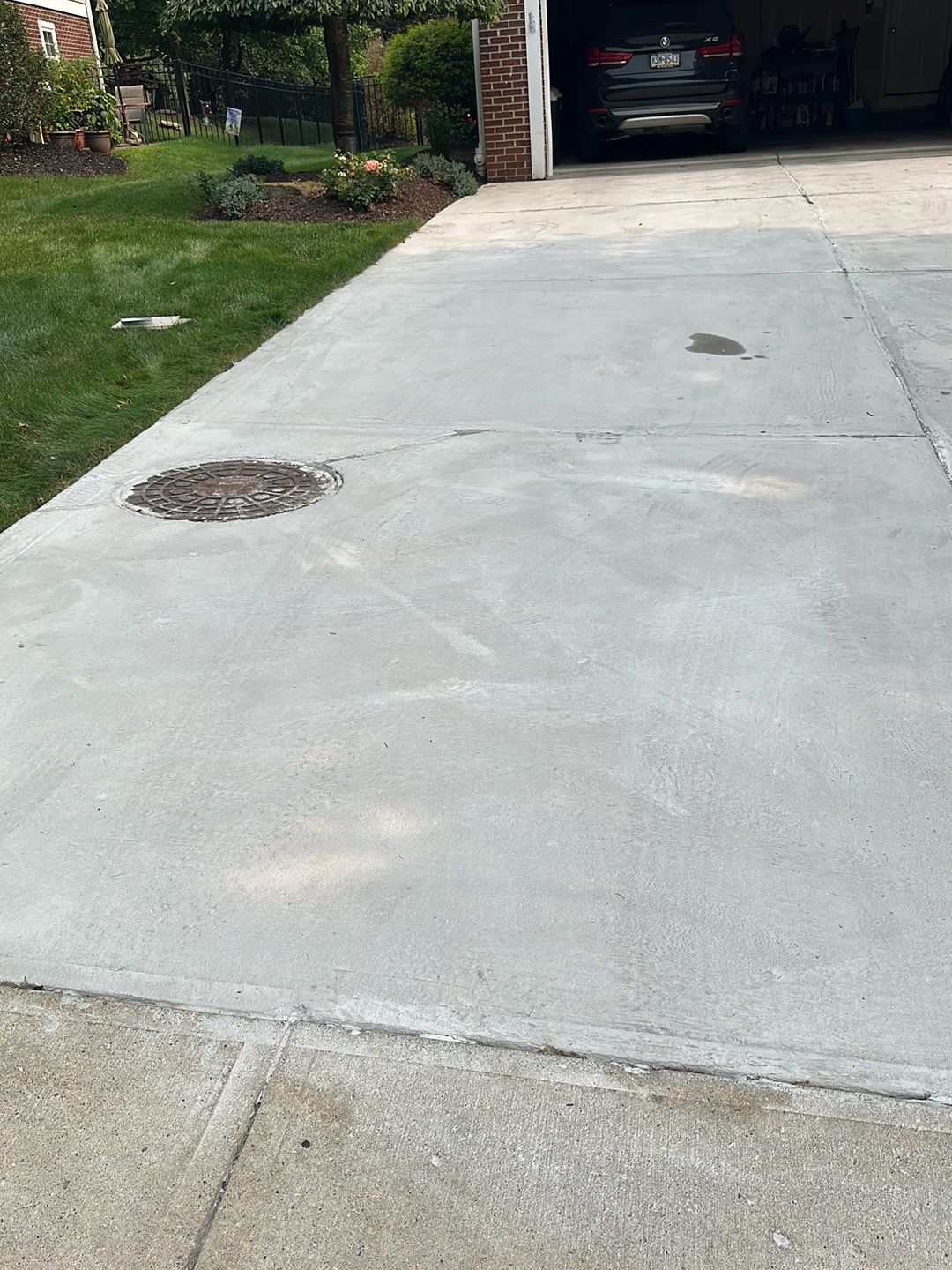 Pool Deck + Driveway + Garage Project in Venetia by Floors in a Day, Inc